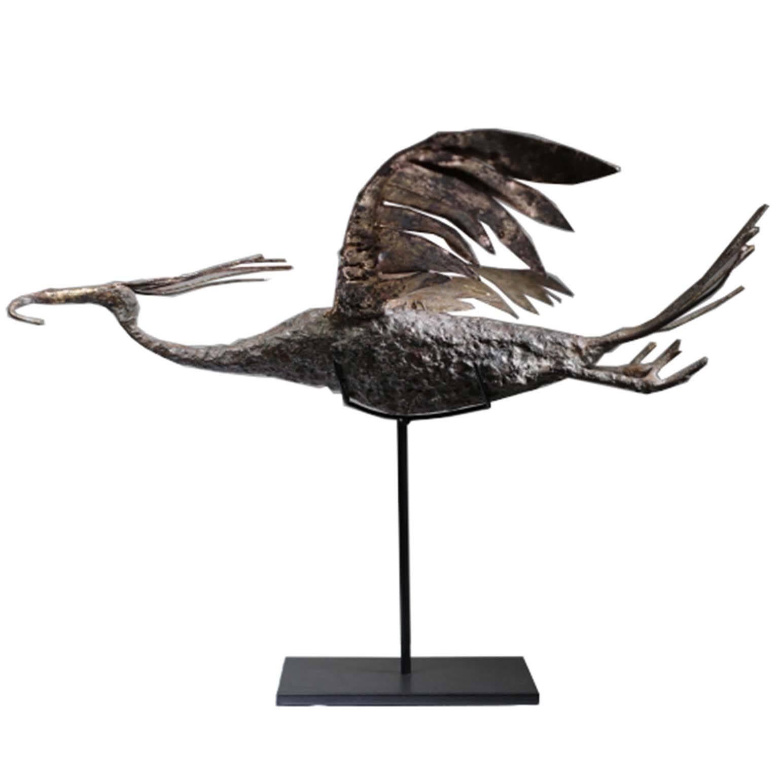Brutalist bronze, copper, brass bird sculpture on custom steel stand, circa 1960s. Artist unknown. Unknown if beak has been bent or if this was intentionally done by the artist.