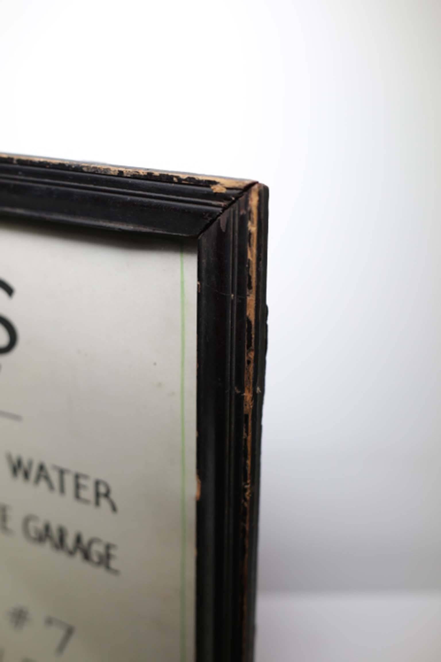 Hotel sign, wood frame with thick glass from the top rated Hotel Drisco in San Francisco.