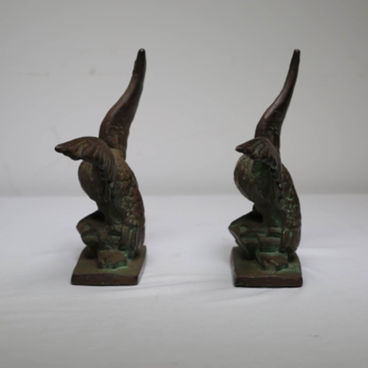 Early 20th century solid bronze eagle bookends, circa 1940s.
