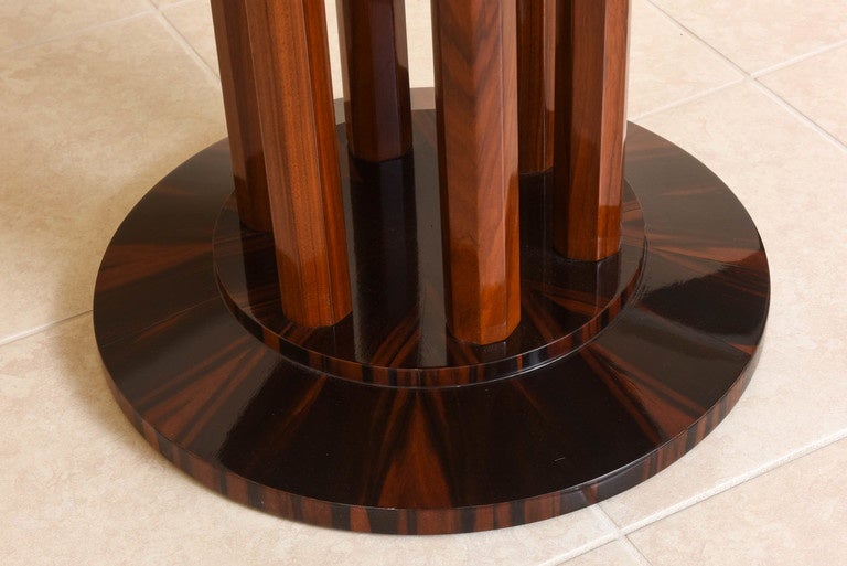 The beautiful Art Deco centre tables was created by the iconic French firm of Maison Rinck in the 1920s. The piece was created in Makassar ebony solids and veneers.

Makassar ebony wood.
Makassar ebony wood is variegated, streaky brown and black,