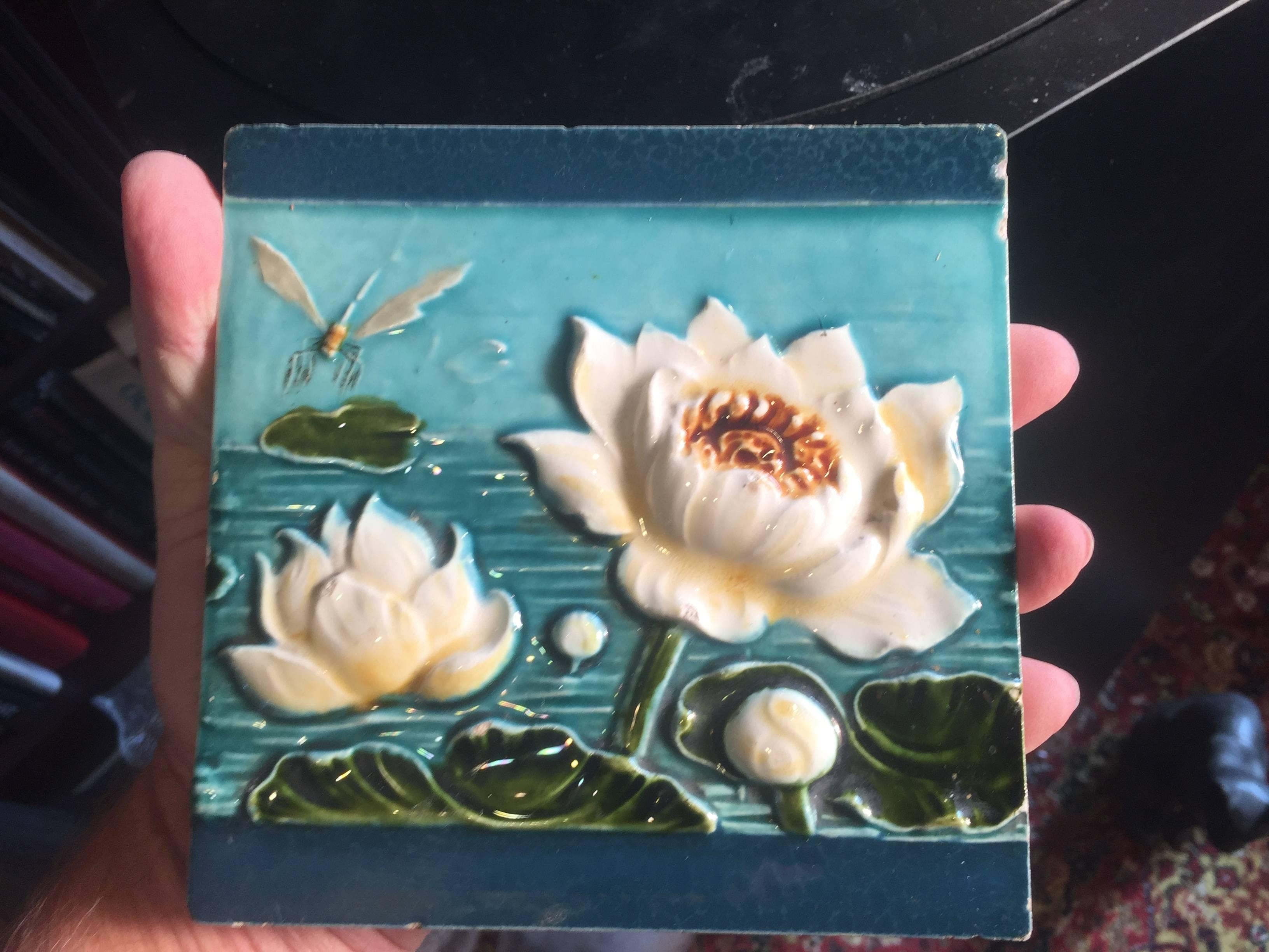 Here's a fine collection of three lovely Art Nouveau ceramic tiles dating to the Jugendstil period (1890-1919), including beautiful dragonfly and water lily designs.

Dimensions: Each tile approx 5.75 inches square each

Impeccable. Fine condition