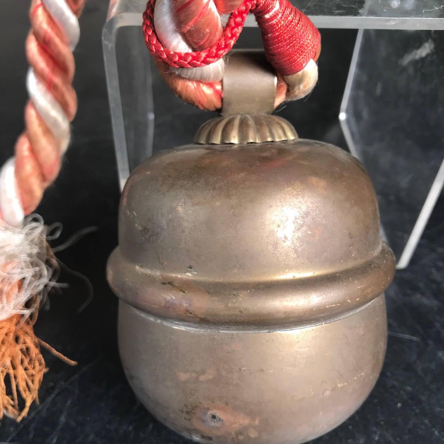 From our recent Japanese acquisitions travels.

Here's an extraordinary opportunity to collect and acquire a Japanese authentic hand cast copper Shinto Suzu bell complete with its long and thick hand crafted pull rope. The bell shows good patina