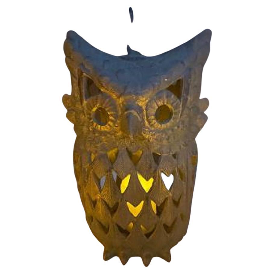 Extraordinary size

Japanese massive over size antique owl lighting lantern, 13 inches tall.

This handsome Japanese quality over sized iron 