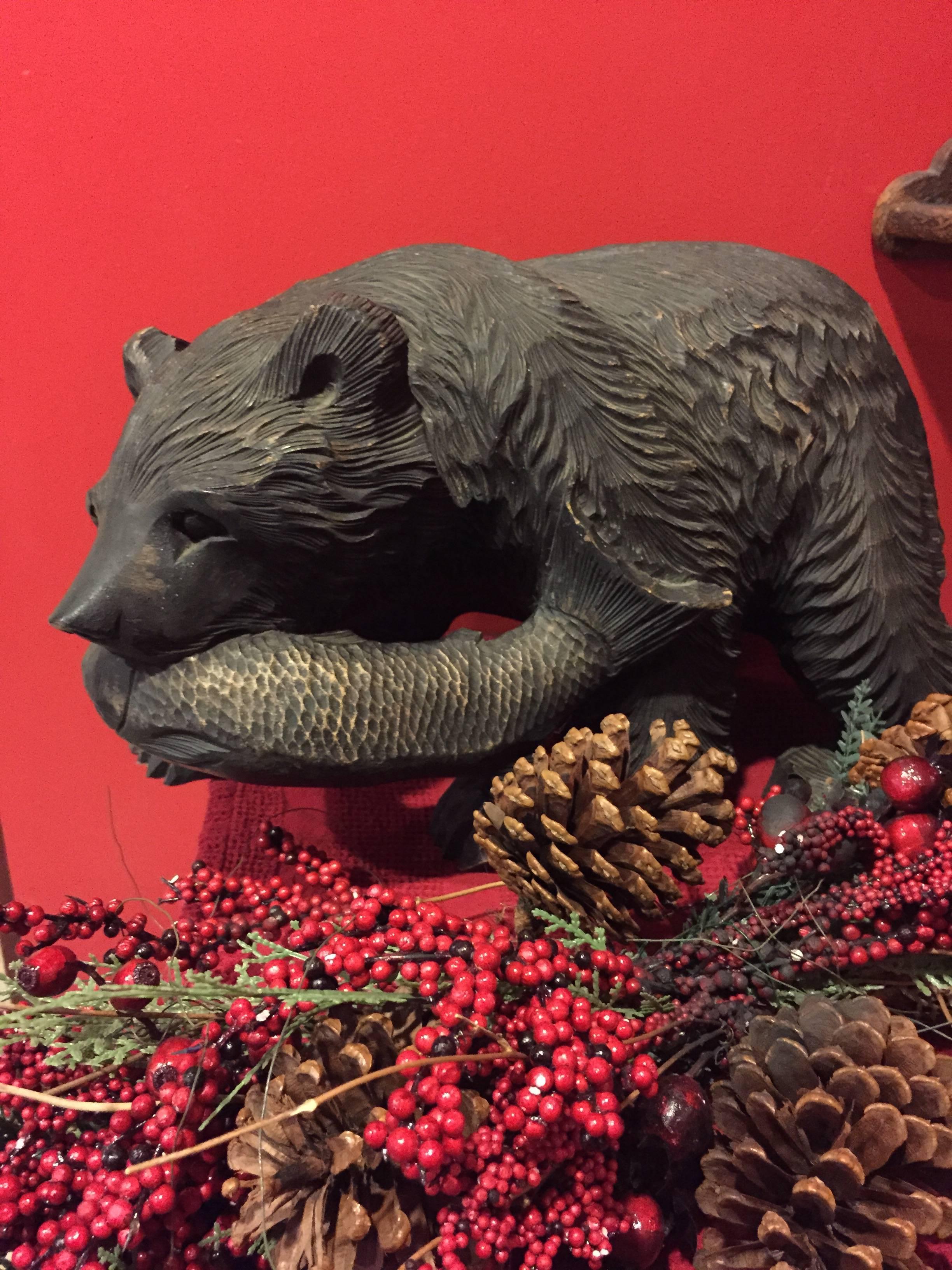 japanese carved bear with fish