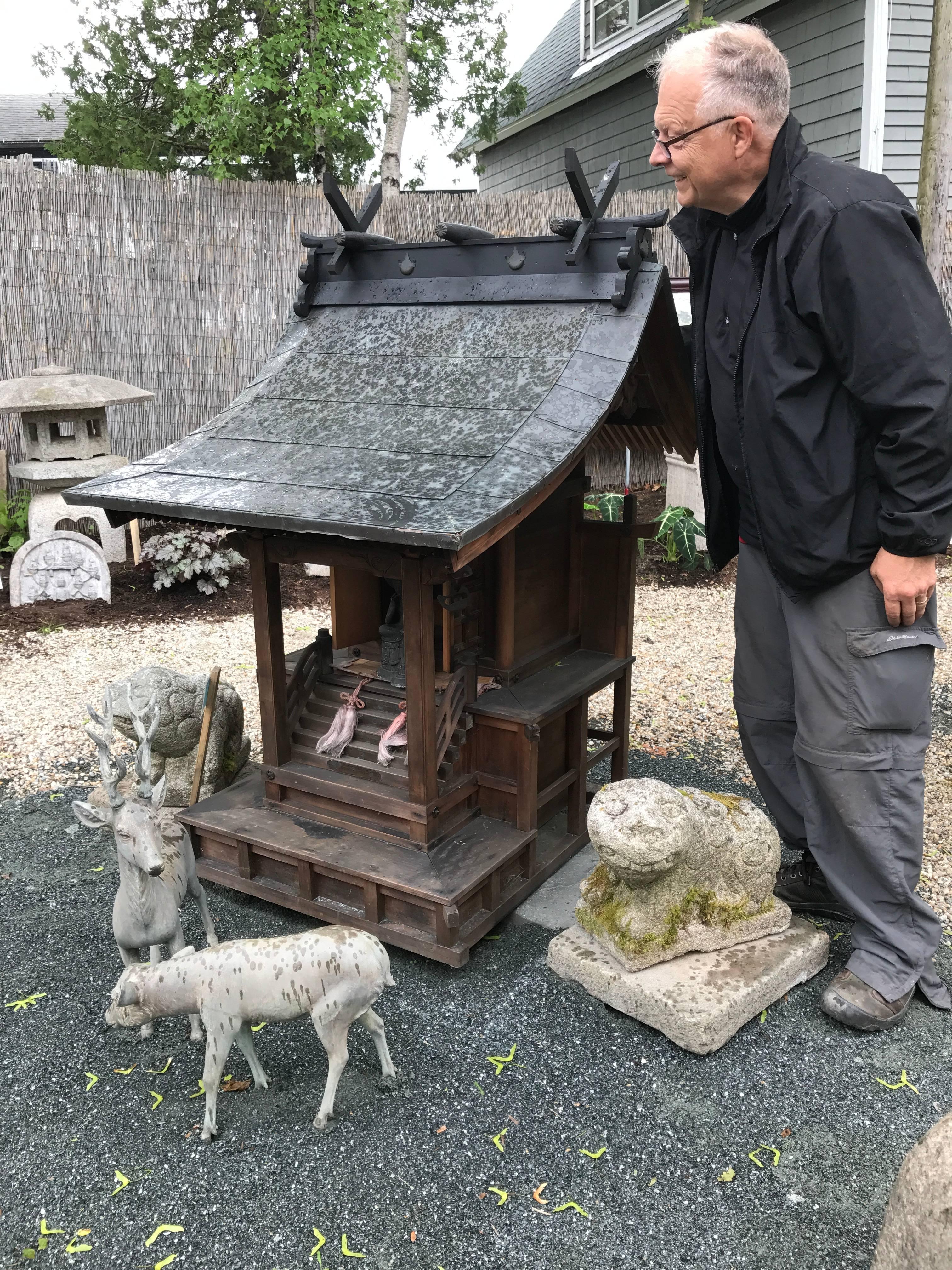 Here's a beautiful and serene way to accent your special indoor shrine space or outdoor garden space with this rare architectural treasure from Japan.

Enjoy this antique 19th century Japanese antique hand made copper roofed and Hinoki wood shrine.