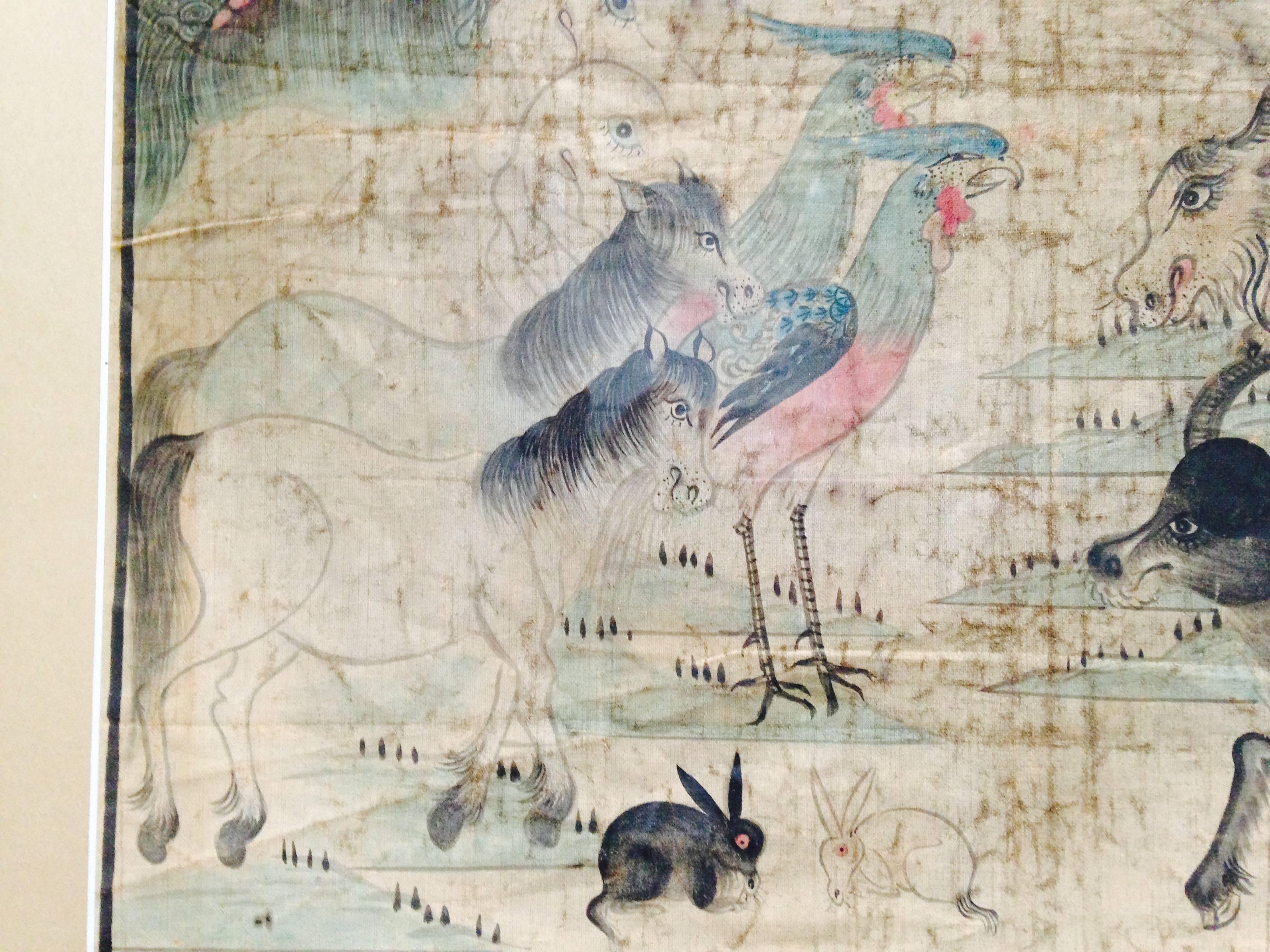 China, an early painted silk panel of Noah’s Ark, frame: 54cm, 21.5” high and 54cm, 21.5” wide, site: 39cm, 15.75” high and 39cm, 15.75” wide, Qing dynasty, 18th-19th century.

The painted textile panel drawn in muted red, blue and black pigments