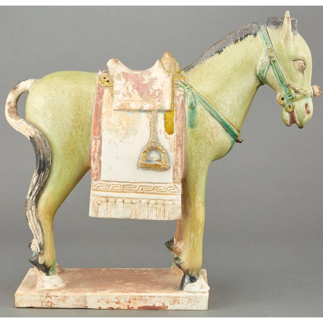 Glazed Chinese green glazed Pottery Model of a Caparisoned Horse, Ming Dynasty, 17thc
