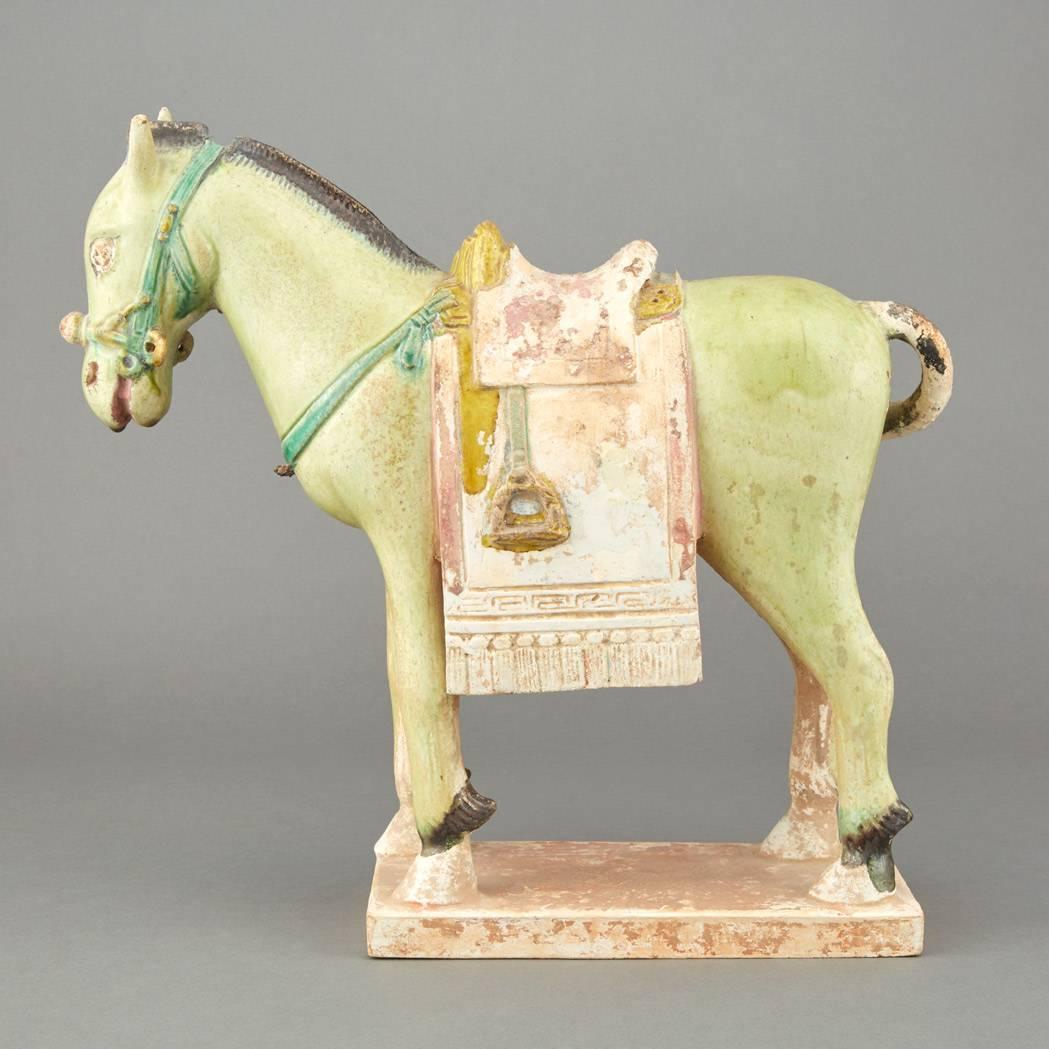 Terracotta Chinese green glazed Pottery Model of a Caparisoned Horse, Ming Dynasty, 17thc