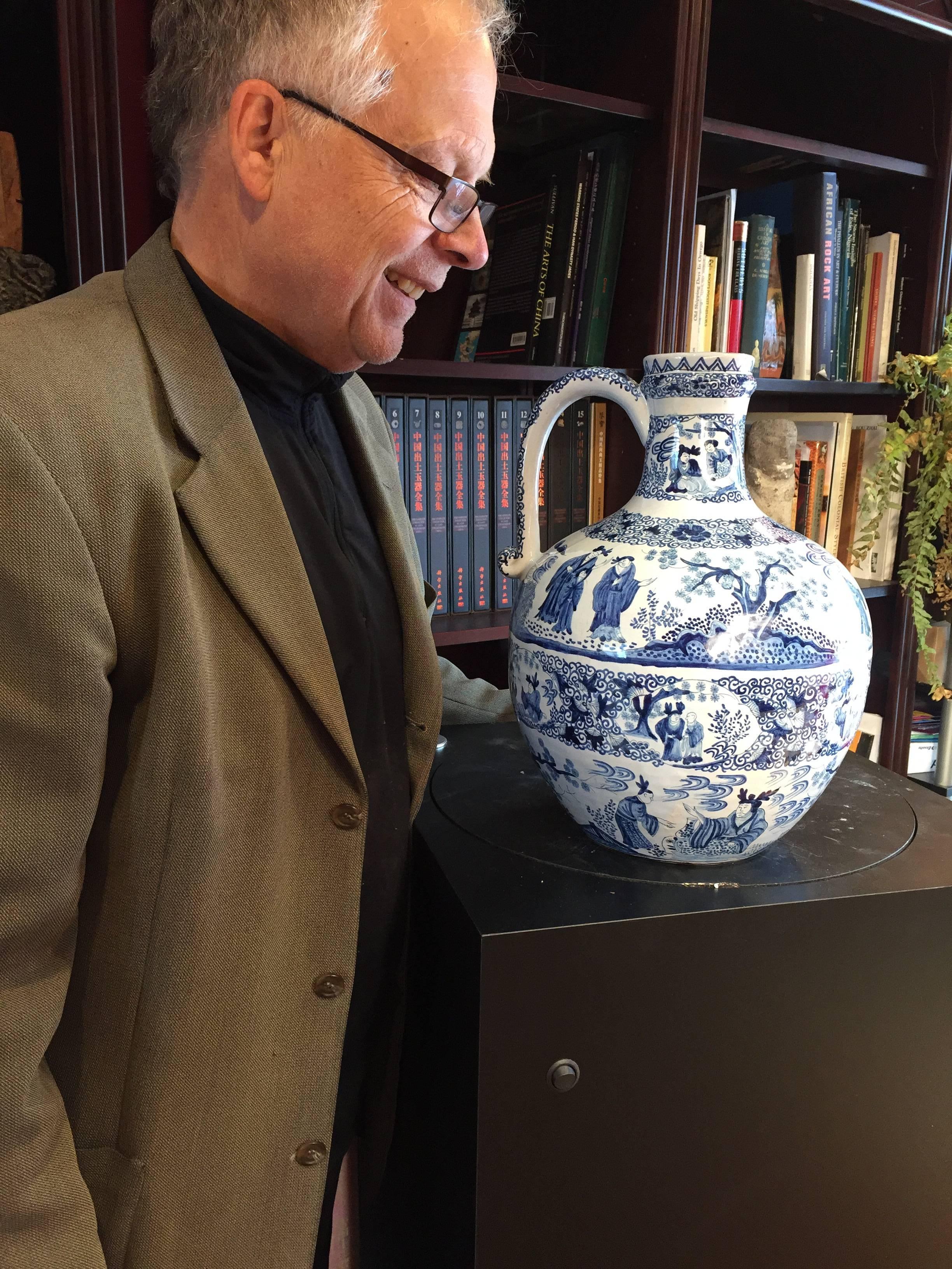 SALE - NOW SAVE 25% AND MORE

A superb hand made and hand painted Delft House 19th century  Chinoiserie  Chinese garden blue and white bottle vase featuring beautiful panels of Chinese figures, garden scenes, flowers, and scroll work including the
