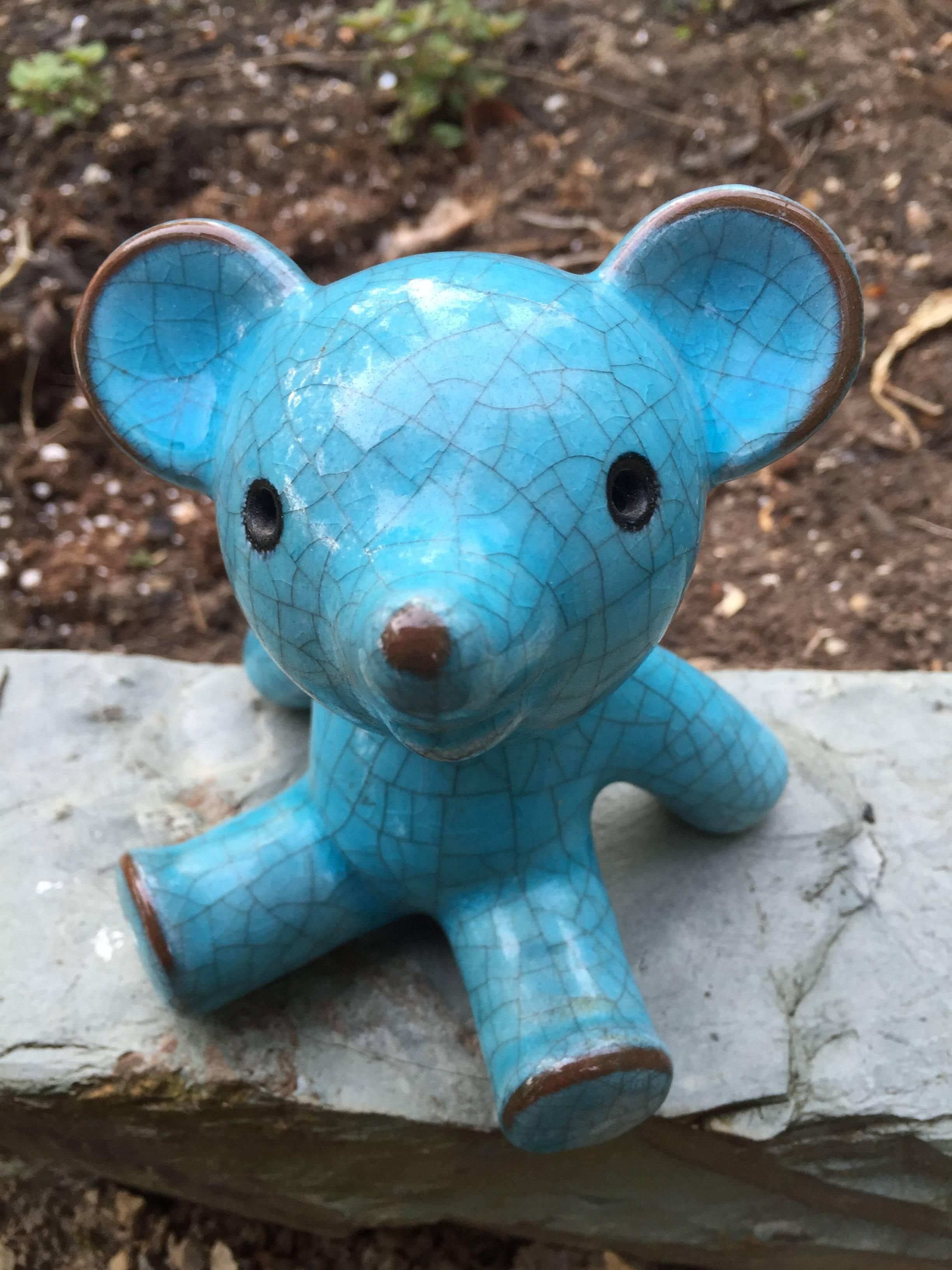 This is a wonderful little gem: German Arts and Crafts, a scarce Mid-Century 1950s hand blue glazed ceramic form of a teddy bear, Karlsruher Majolika by designer Walter Bosse, 4.5