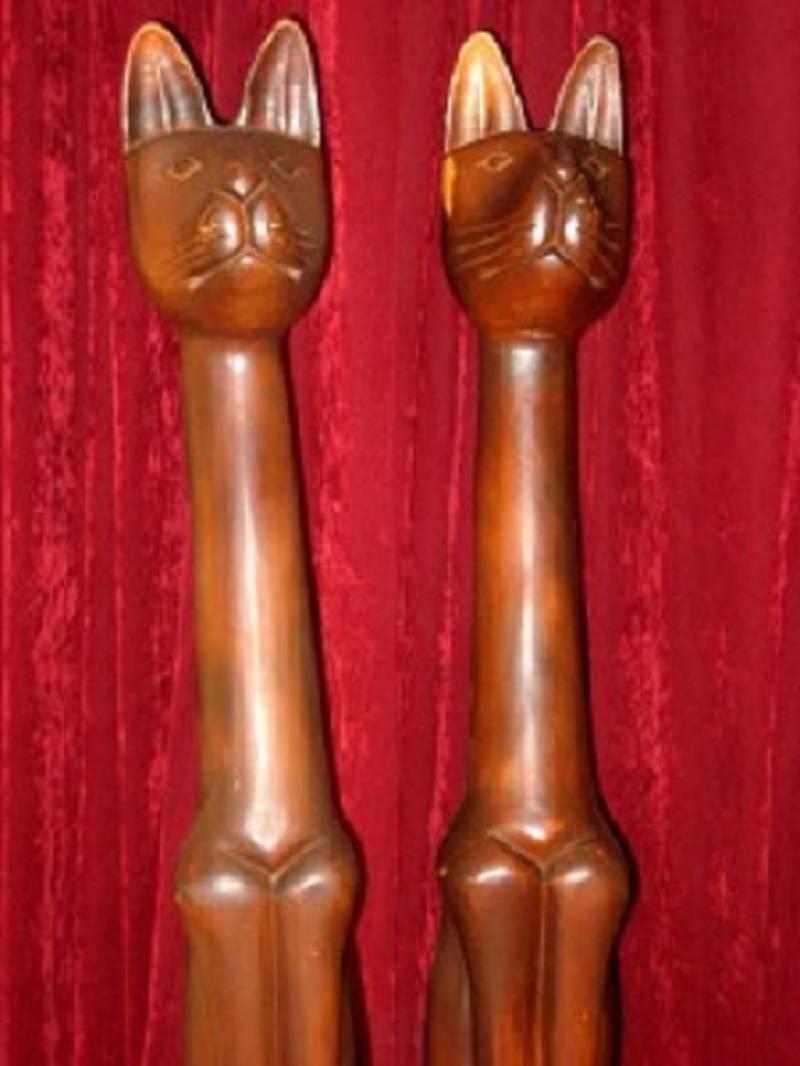 tall wooden cats