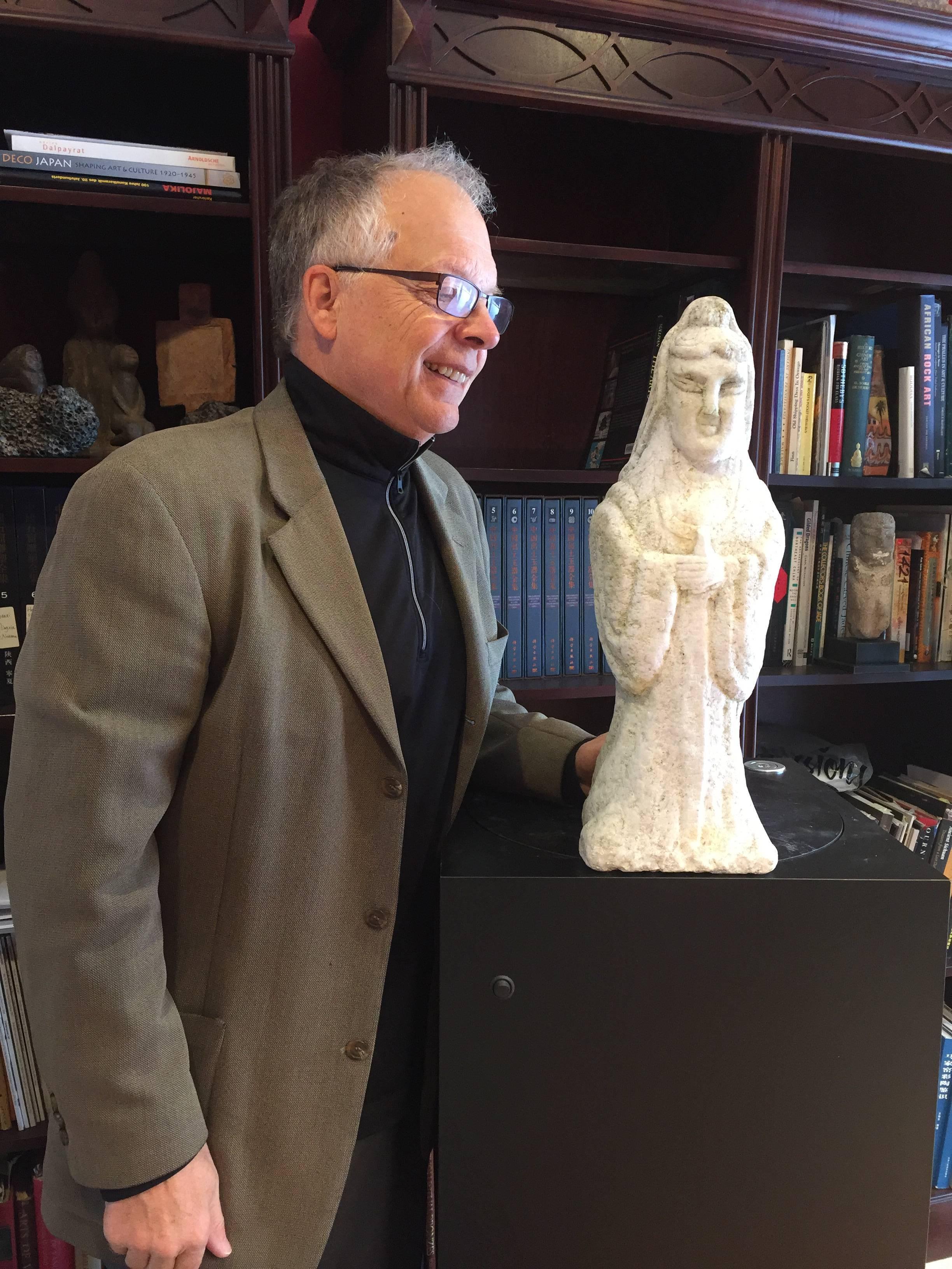 A good opportunity to acquire a tall and handsome effigy of a Chinese  hand-carved marble Guan yin , Buddha's attendant. 

Coming from our private collection, it would look superb in your favorite space indoor or out of doors. Portable substantial