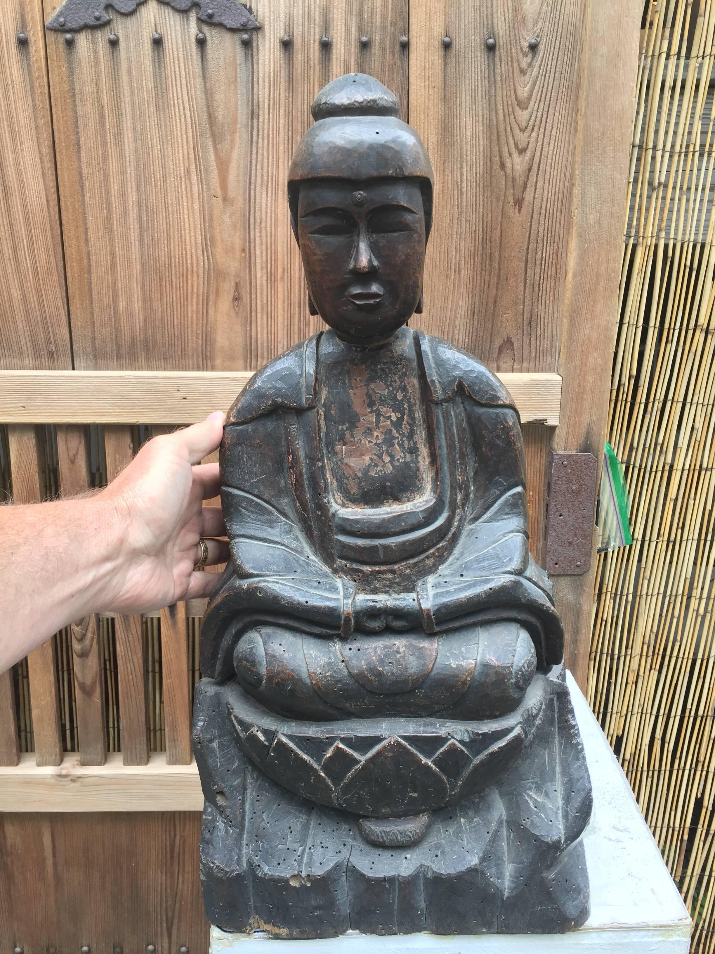 antique wooden buddha