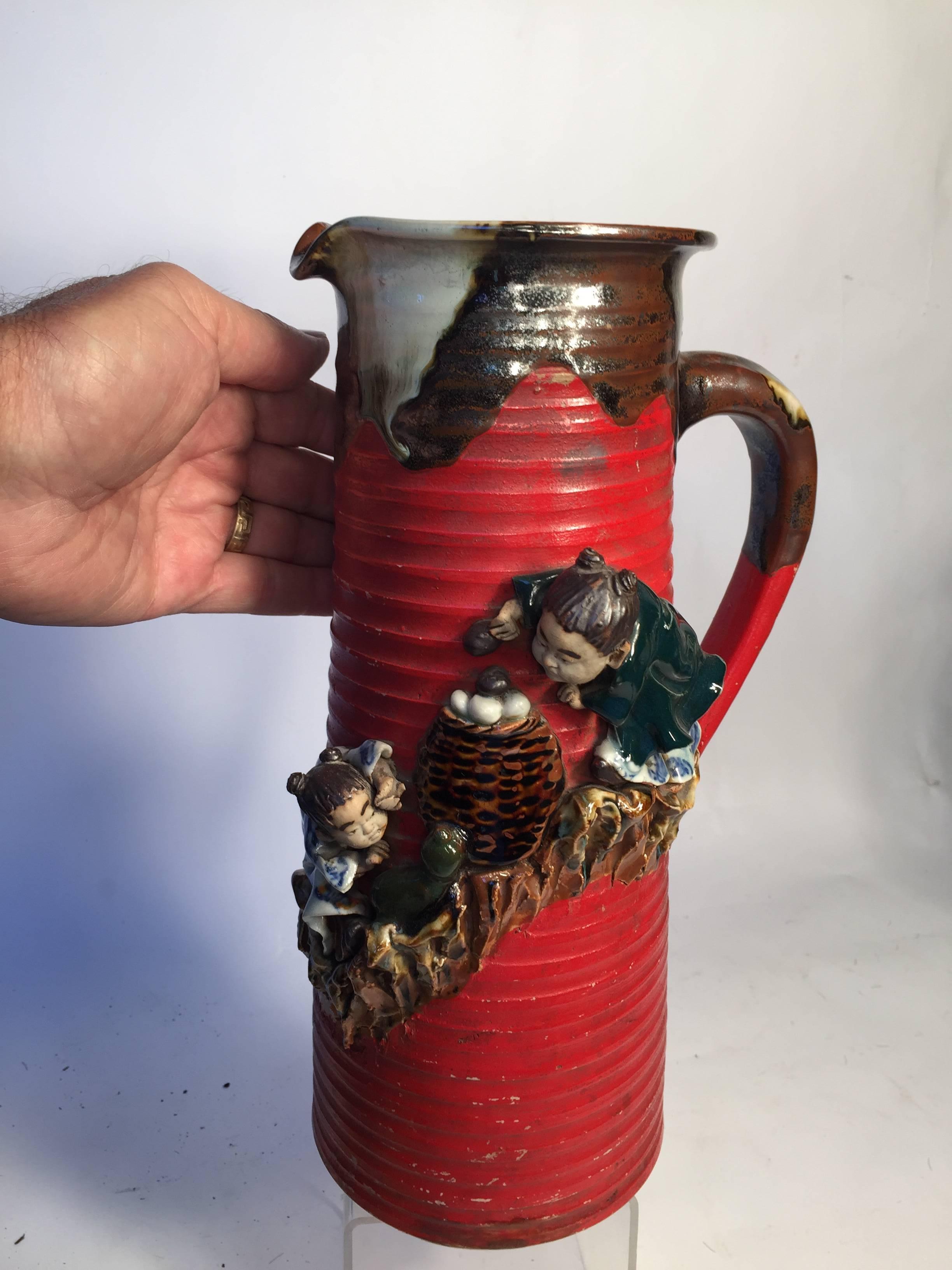 Japanese Japan Antique Hand made hand glazed Pitcher with Two Playful Youths , signed 