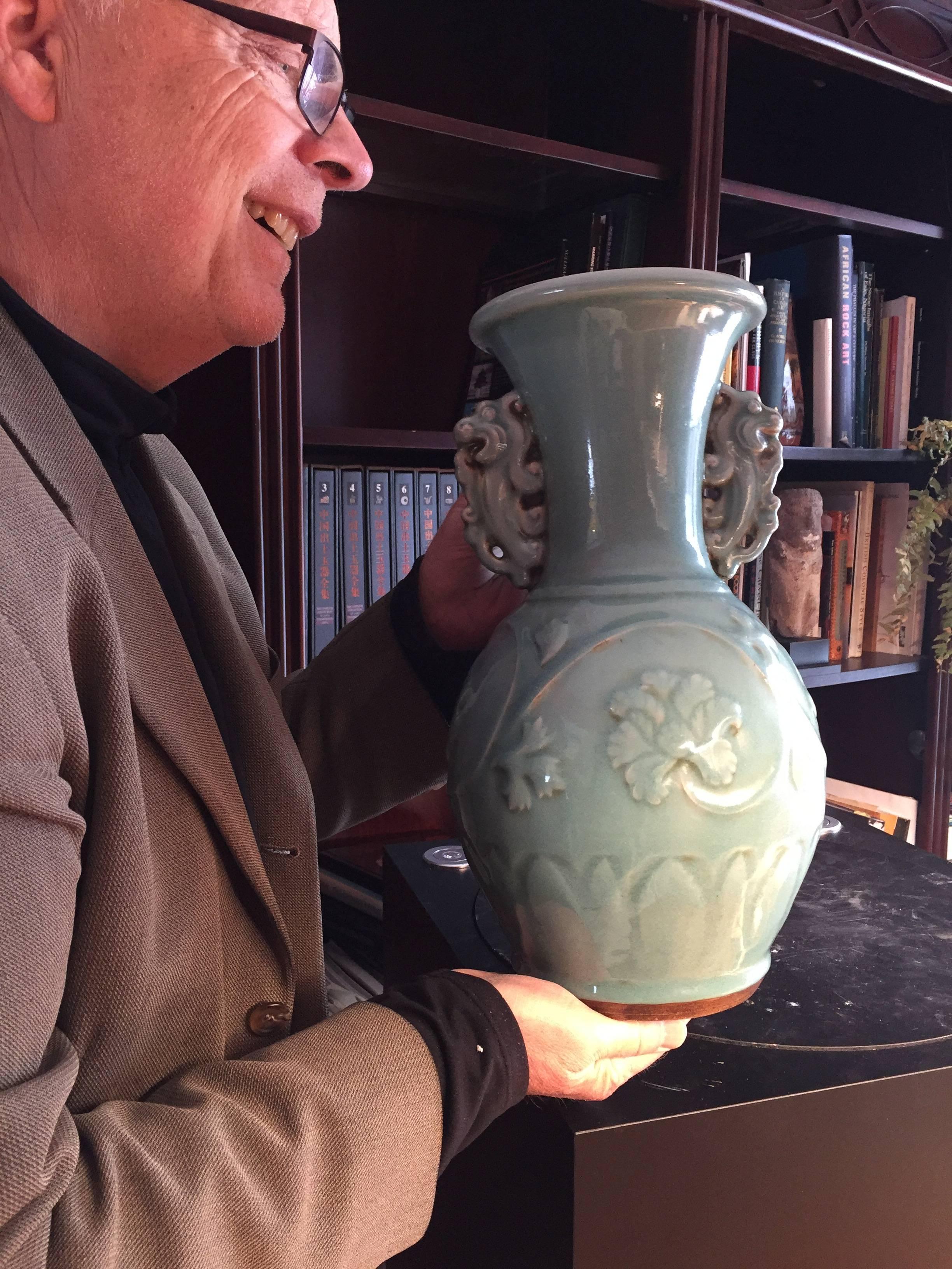 A rare Japanese temple provenance comes with this large high vase one of my partners discovered.
 
China, Longquan style celadon double ear vase, mid  20th century manufacture, wide, fine quality.

Lovely color, hard to improve on this one.

Hand