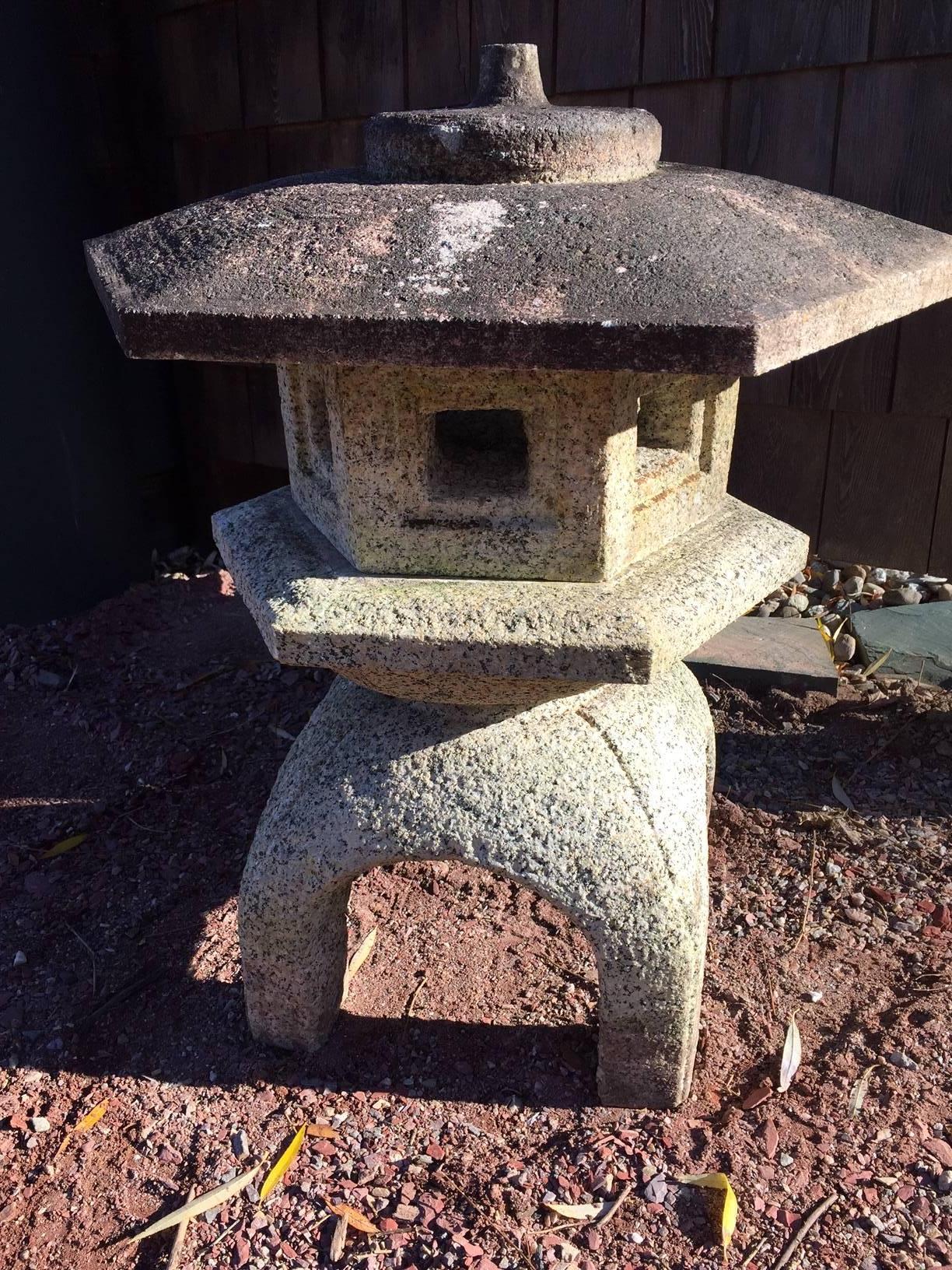 Japan antique “Yukimi” hand carved granite stone lantern (also known as a  snow lantern because of its broad roof), four pieces

Dimensions: 25 inches high and 25 inches wide

Period:  Taisho to Showa periods, 1912-1930's.

Quality:  A beautiful