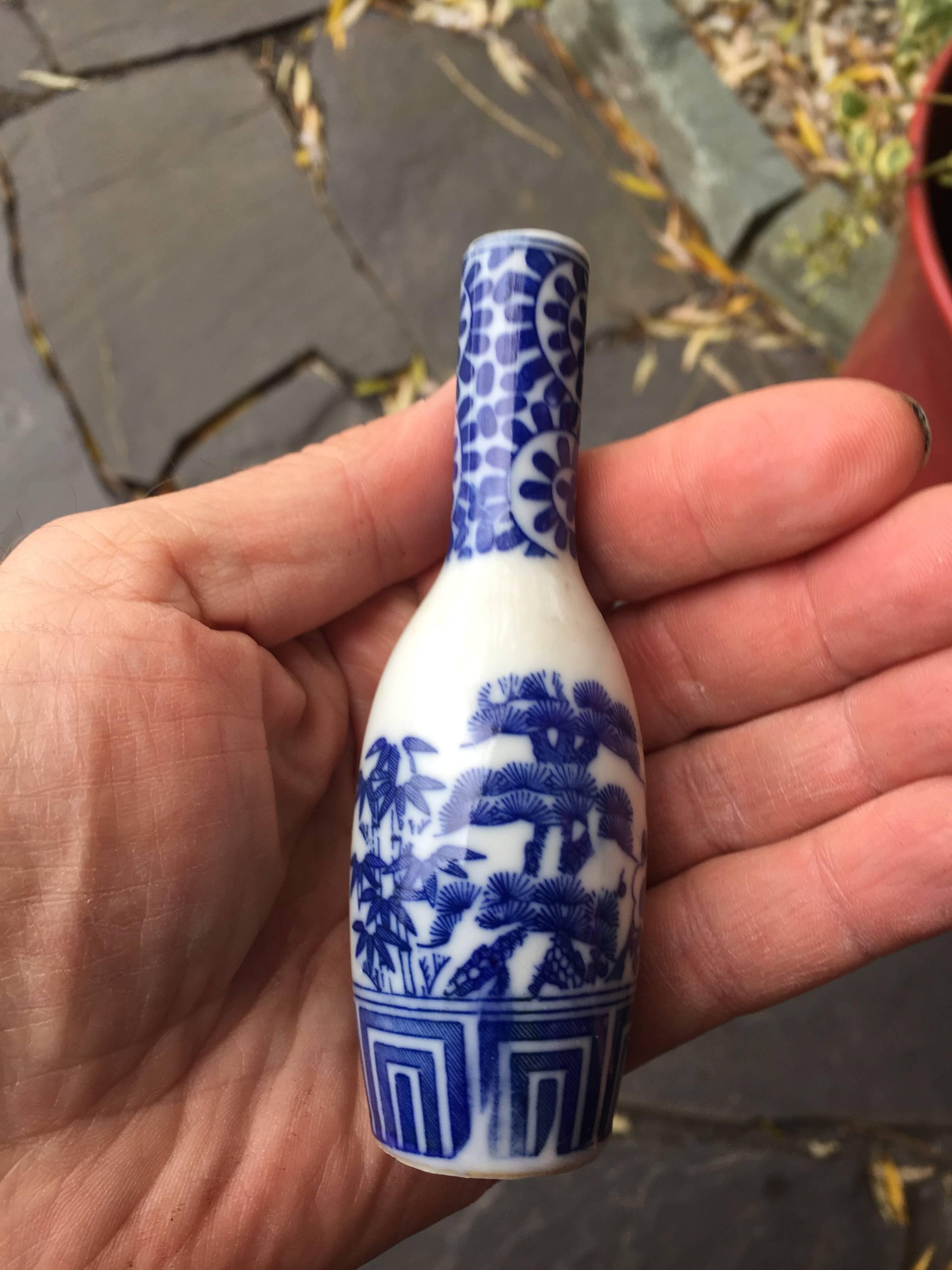 Japan, a collection of six antique blue and white porcelain sake bottles, 19th century. These are beautiful little gems, hand-painted in Classic floral patterns from the Arita kilns. Very good condition. Make unique bud vases and as