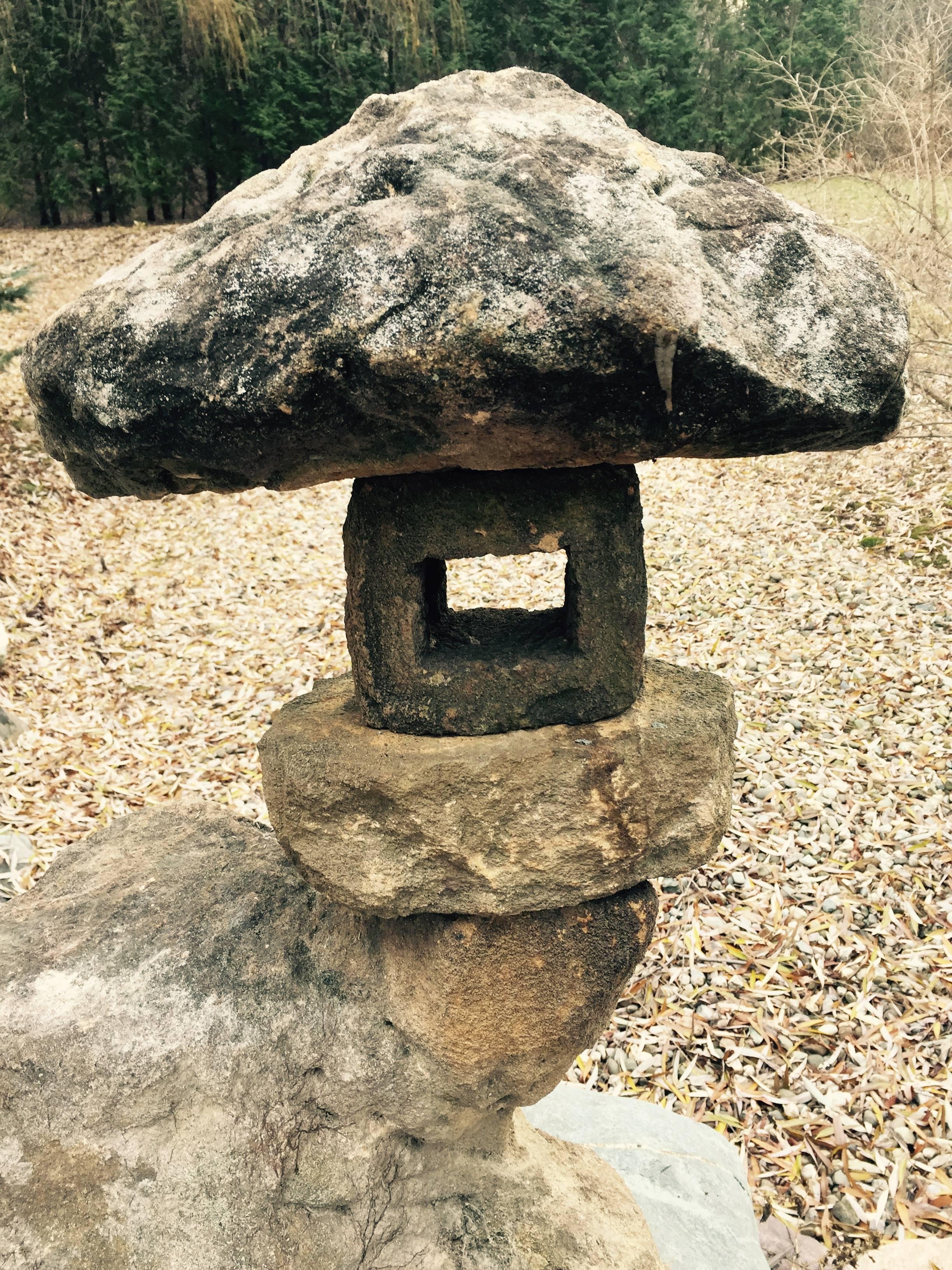 Here's a beautiful and unique way to accent your indoor or outdoor garden space with this rare treasure from Japan .

From an old Japanese Nagoya garden comes this authentic hand carved and hard to find Spirit mountain style stone lantern, 34