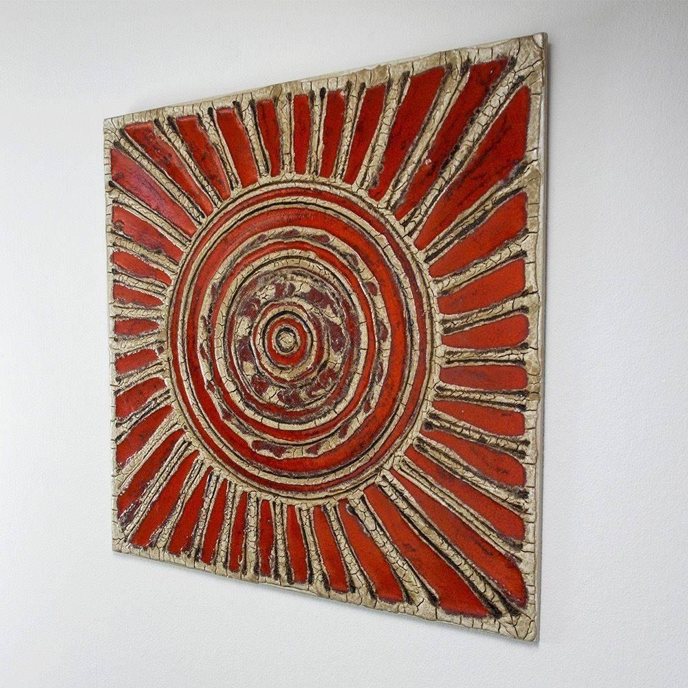 An early contemporaryhand made and hand glazed  mid century Sun Burst or Bulls Eye Keramik Wall work of art with rich red and cream colors, 1950

Designer/Maker: early Ruscha about 1950.

Glaze: The rich red and cream colors are aged to perfection