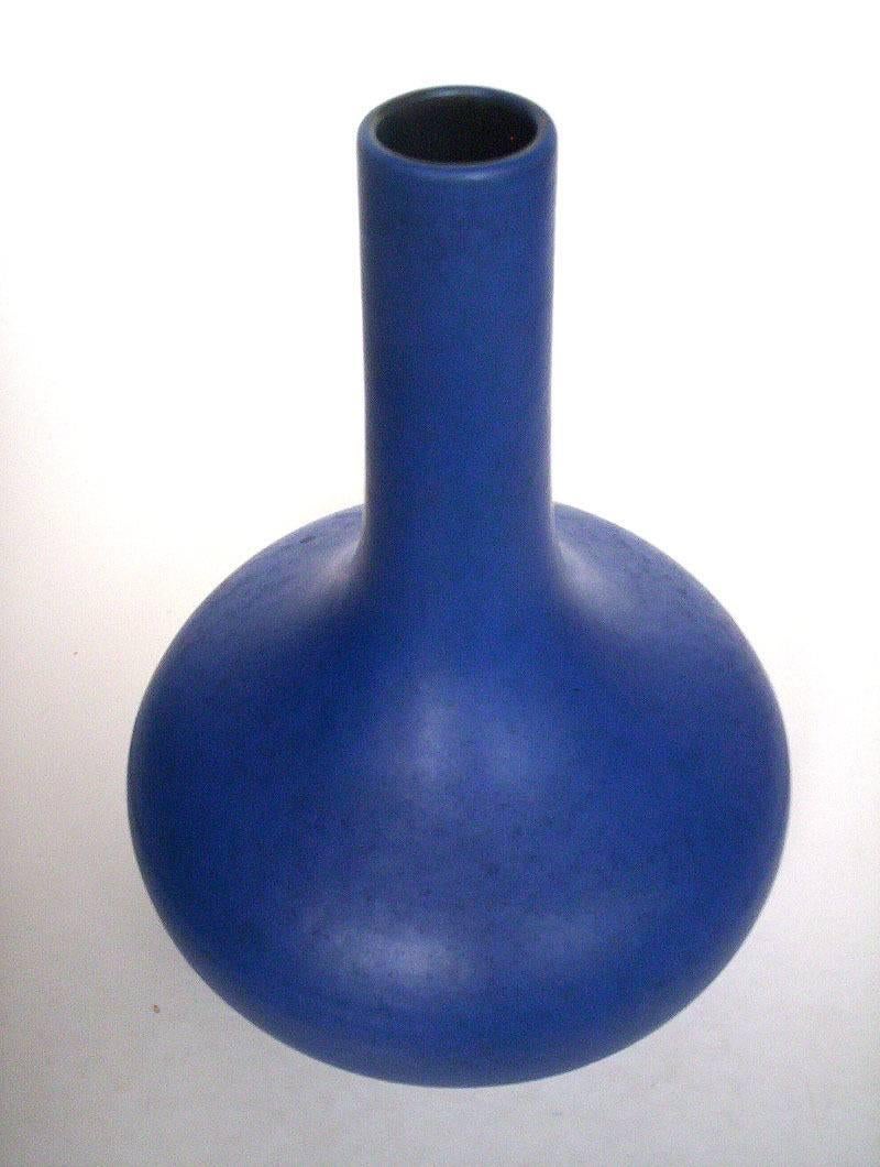 SALE - NOW SAVE 25% AND MORE

Designers source

An early contemporary dazzling blue tapered bottle form pottery vase handmade and hand glazed in 1965

Designer/Maker: Kreutz-Keramik, Helmut Kreutz, Haiger-Langenaubach, founded in 1958, number 428