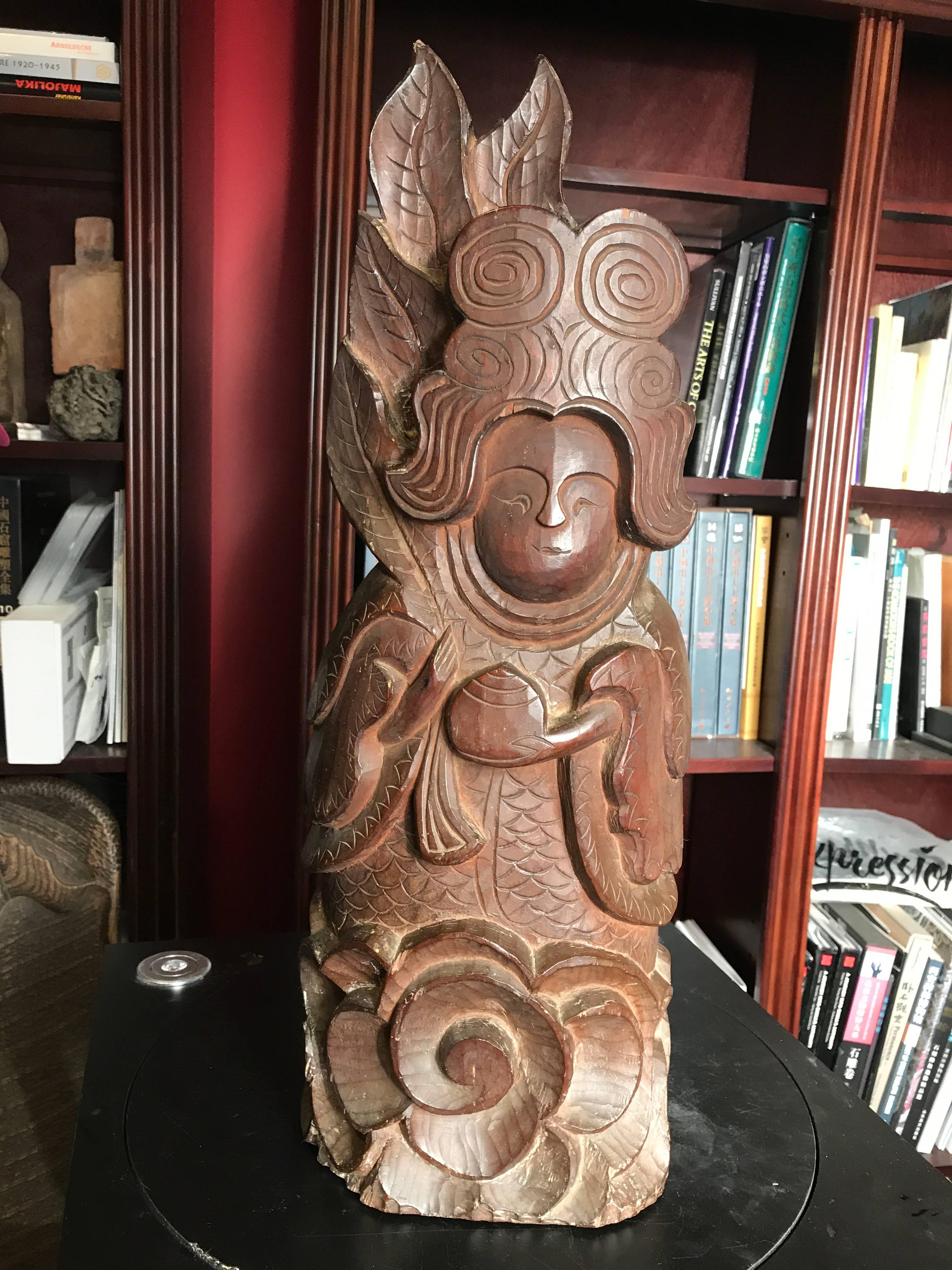 Goddess of Beauty, 26 inches tall

Japanese fine hand-carved image of Kichijoten and monumental painted wood sculpture of Kichijoten holding a jewel or tama, from the early 20th century.

Carved from one block of wood, Kichijoten is the Goddess of