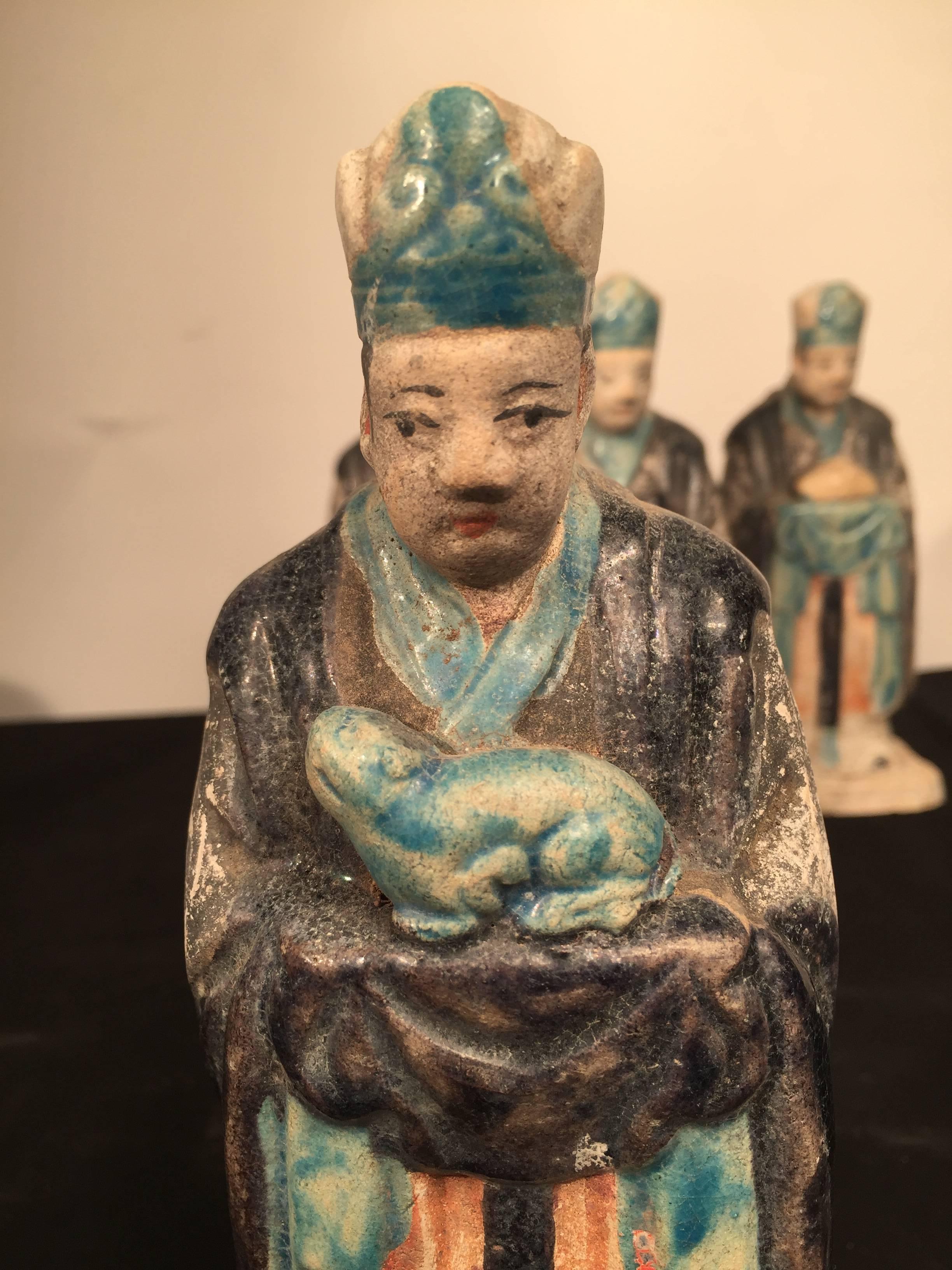 Important Ancient Chinese Zodiac Figure holding a TIGER , Ming Dynasty 1368-1644

This interesting zodiac figure is one in a series of twelve (12) tomb figures each brandishing a different animal from the zodiac. Look for other listings offering the