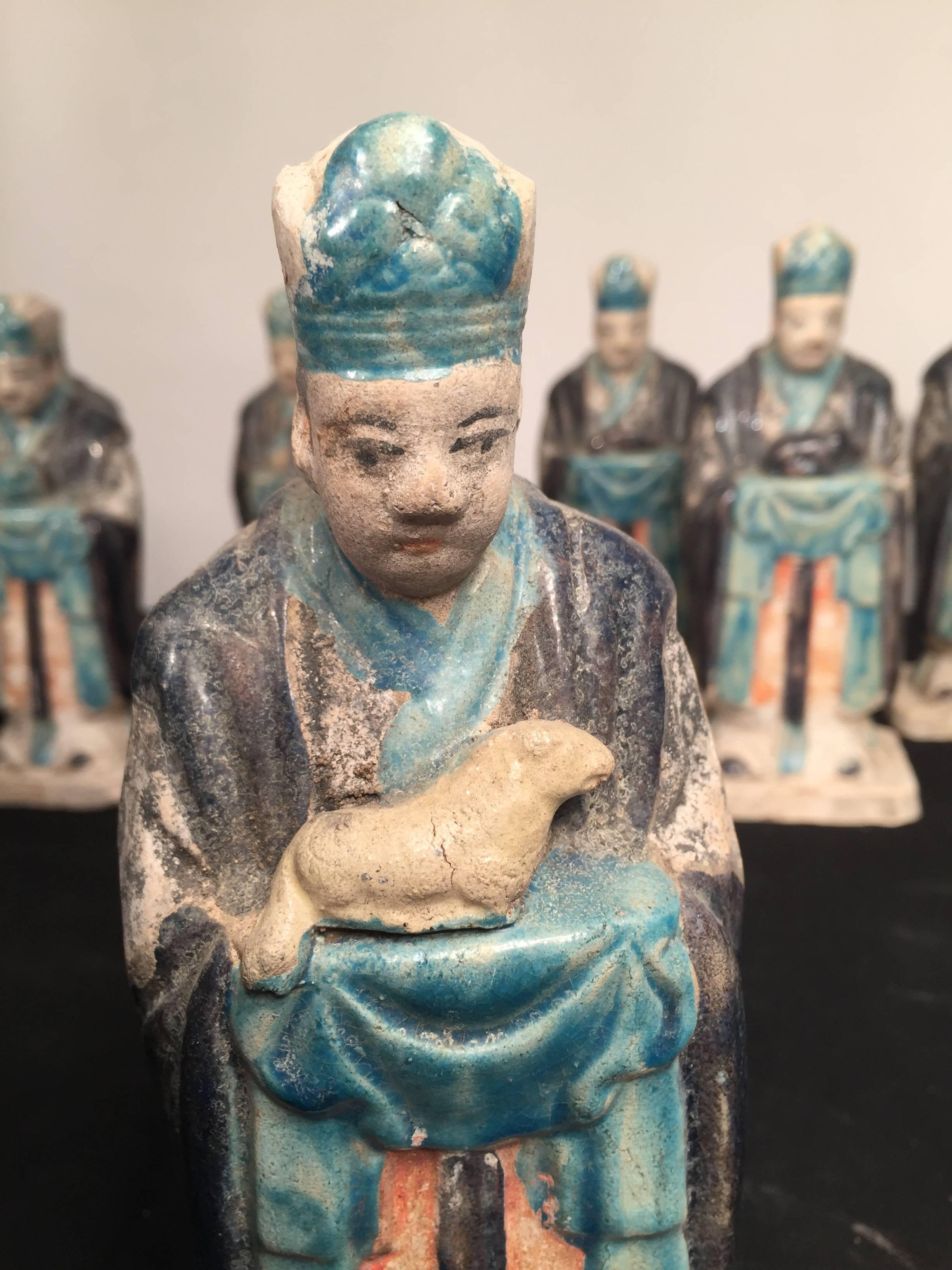 Important ancient Chinese Zodiac figure holding a horse, Ming dynasty, 1368-1644 

This interesting zodiac figure is one in a series of twelve (12) tomb figures each brandishing a different animal from the zodiac. Look for other listings offering