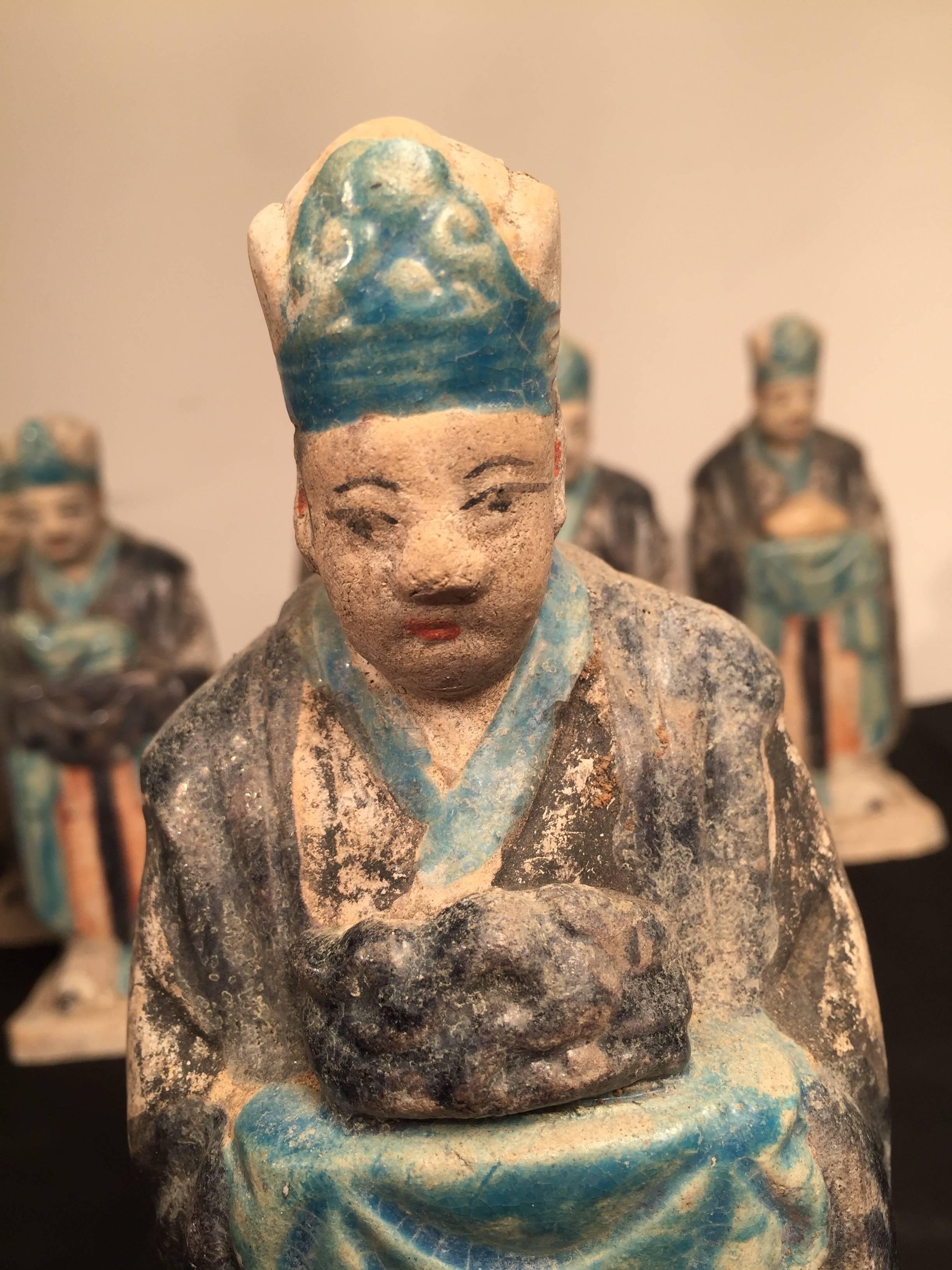 Important ancient Chinese Zodiac figure holding a dragon, Ming dynasty, 1368-1644 

This interesting zodiac figure is one in a series of twelve (12) tomb figures each brandishing a different animal from the zodiac. Look for other listings offering