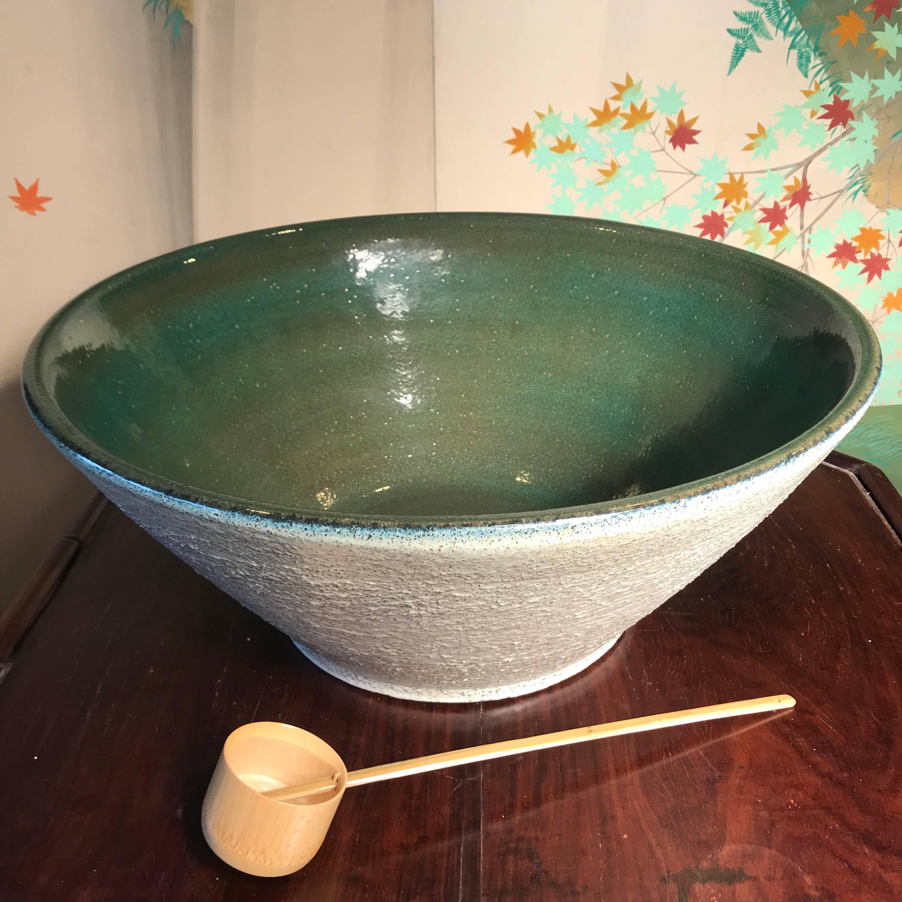 Japan, an attractive and  large one-of-a-kind  hand thrown and hand glazed green and cream colored stoneware bowl vessel mizubachi. Thick and creamy glazing like only Japanese artisans master.

We will also include a complimentary Japanese made