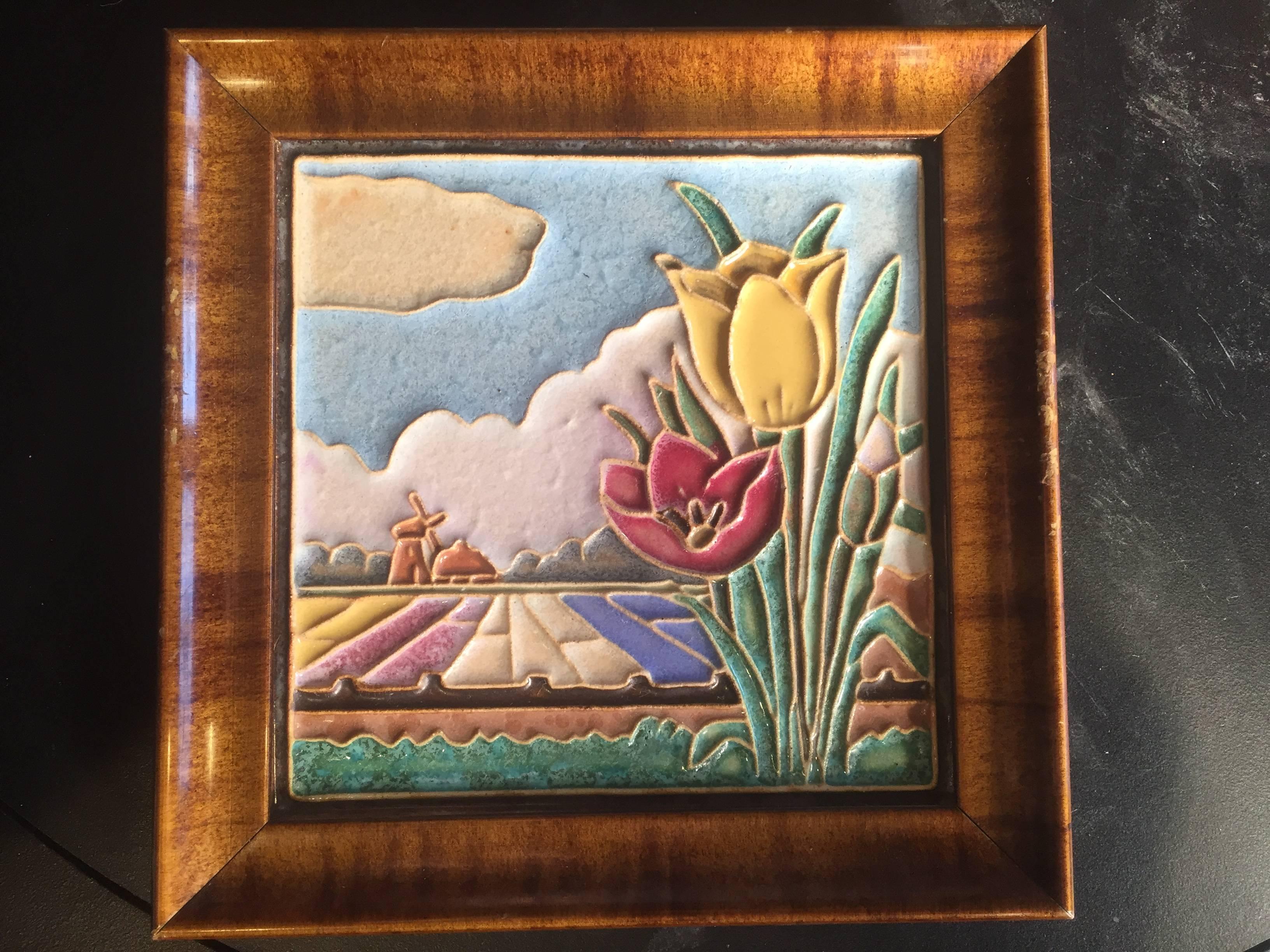 Here's a fine collection of three lovely framed hand-painted and hand glazed delft flower themed ceramic tiles dating to the mid last century including beautiful daisies, tulips, and nostalgic decor.

Dimensions: Each tile approximately 5 inches