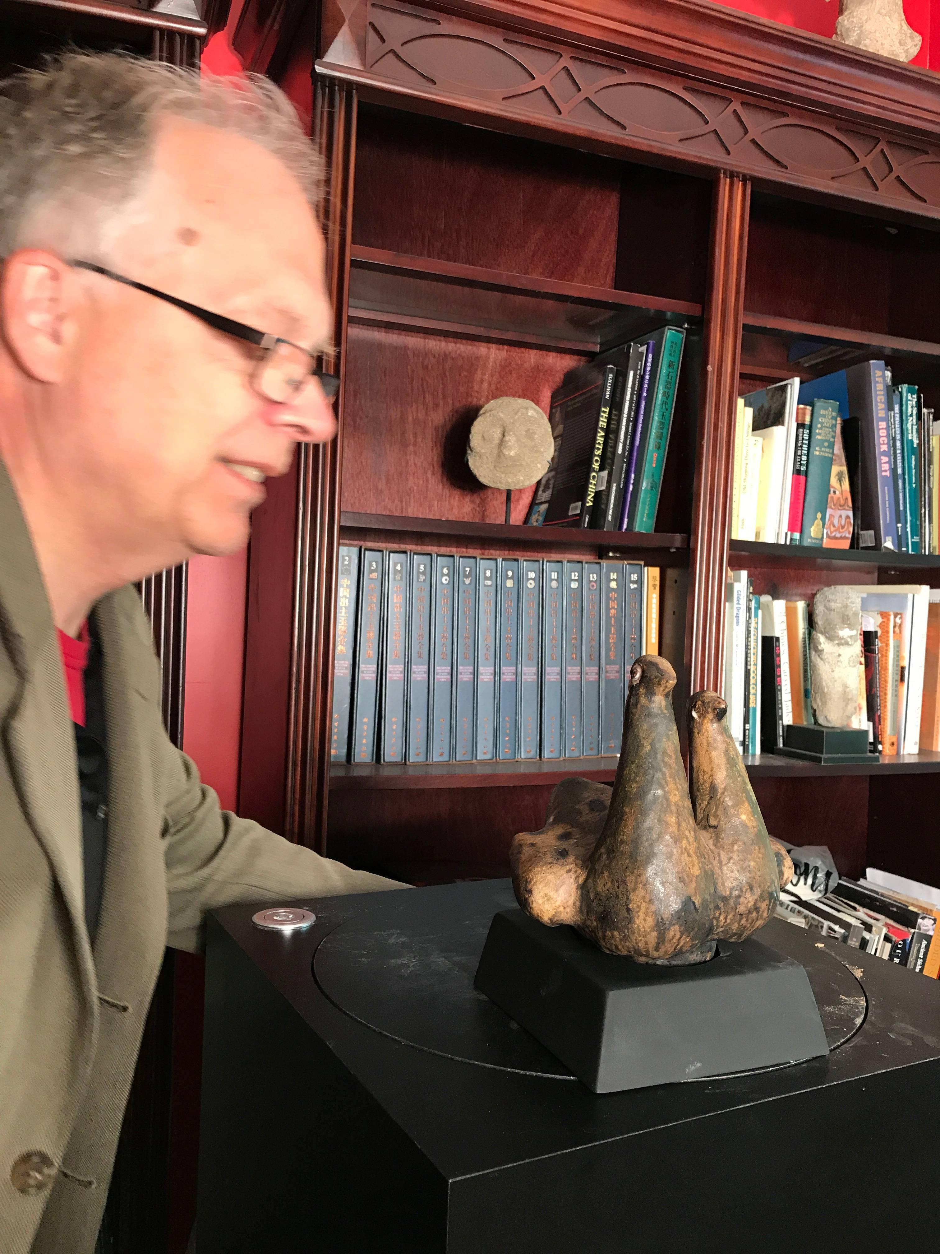 An antique handmade, hand glazed two dove birds sculpture finished in brown, cream, and earth tone hues, 1950 

Original condition. A real treasure find.

Includes custom made black wooden display base as shown.

Dimensions: height with base  10