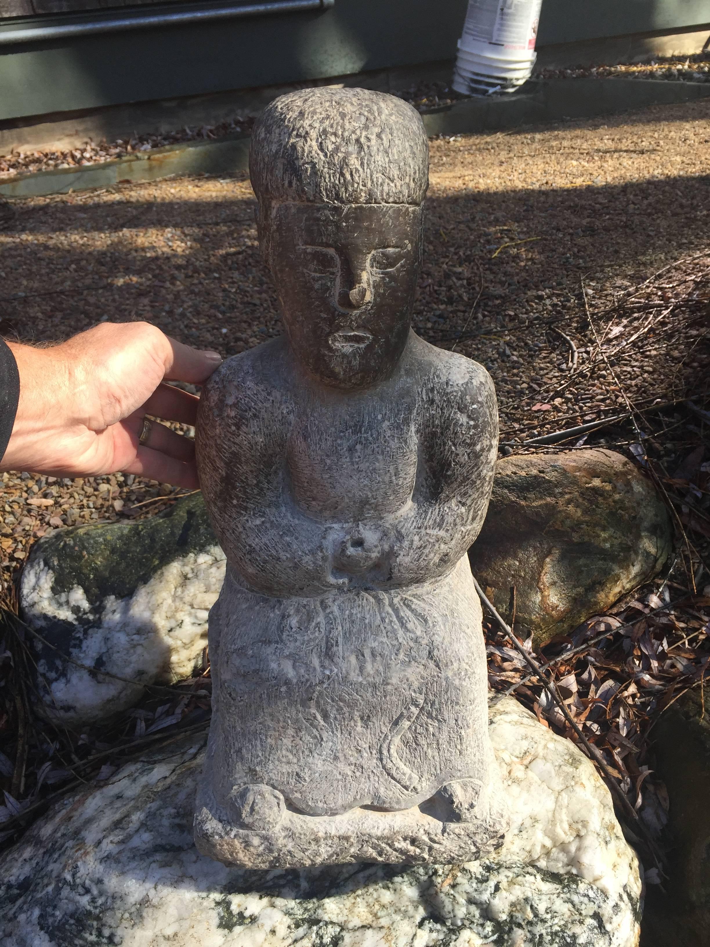 This is a rare and very unusual 20 inch tall spirit mother figure hand-carved from solid limestone. It dates to several hundreds of years ago to the Qing dynasty or earlier (1644-19111). We acquired it for our private collection during one of many