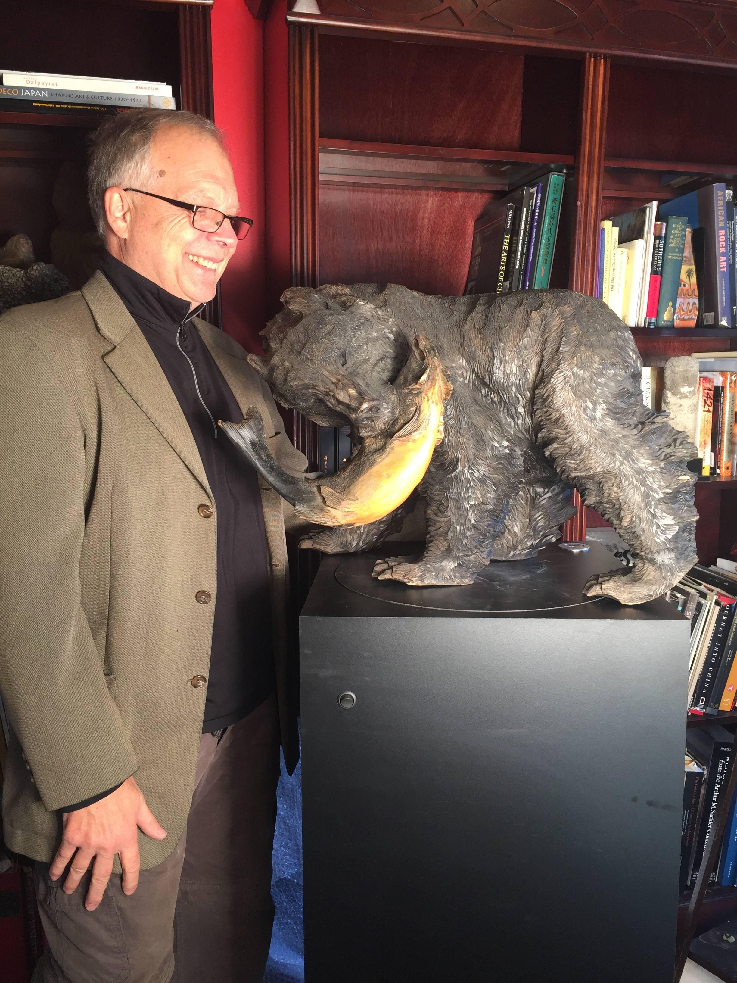 Japanese fine old handmade and hand-carved large-scale wooden carving of a bear Higuma grasping a salmon fish, cryptomeria (cedar) wood and in large-scale, a large one 26 inches in length.

Quality: Hand-carved with rich and deep realistic hair