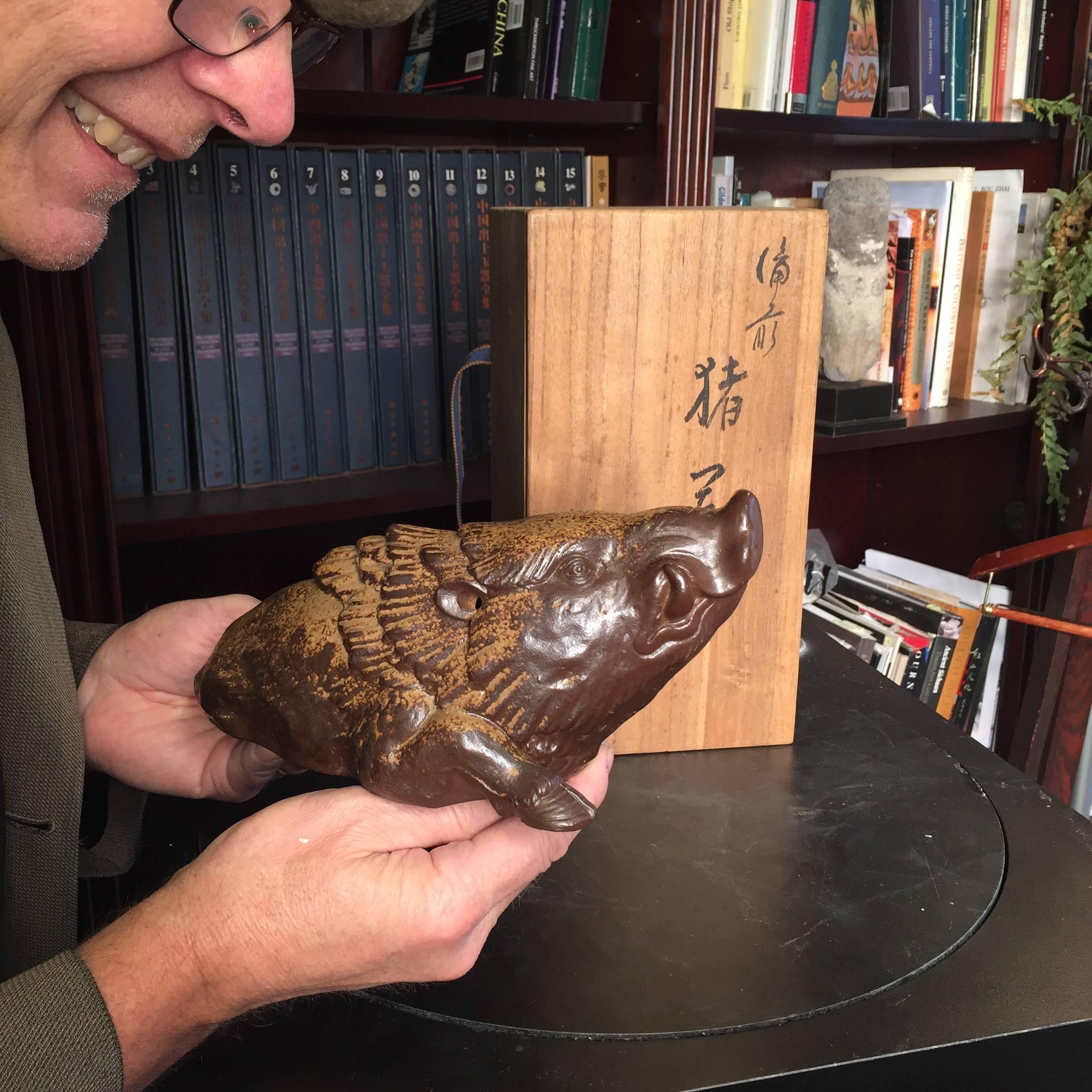 Signed, mint and boxed!

Here's a beautiful and unique way to accent your indoor space with this very unusual treasure from Japan! 

This is a finely crafted, realistically finished ceramic effigy of a magnificent charging boar. It is accompanied by