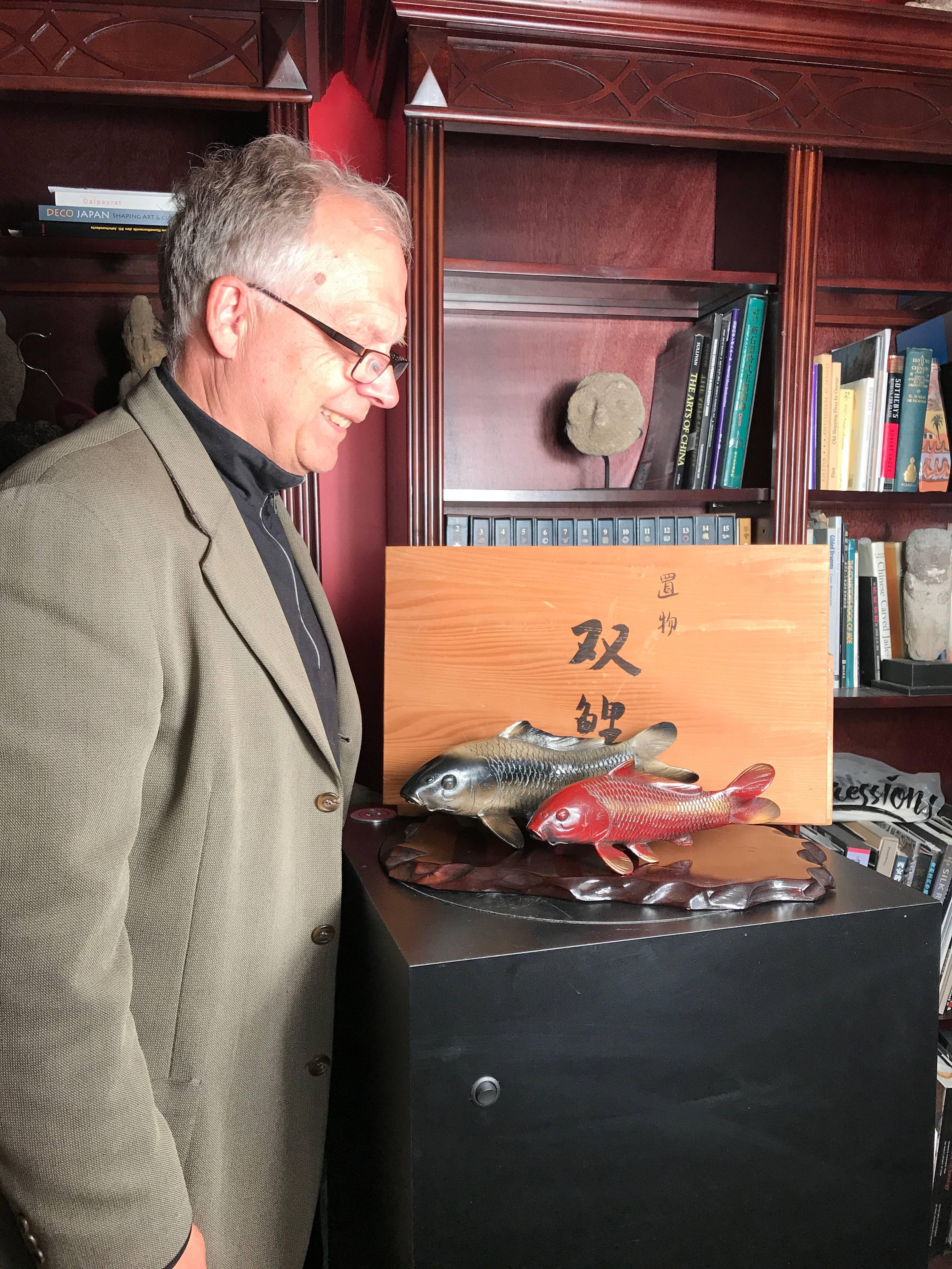 Signed, mint and boxed

Here's a rare find from a collector we visited in Kyoto. A very unusual treasure from Japan. 

This is a finely crafted pair of bronze koi one in white color and one in brown color and both accompanied by their original