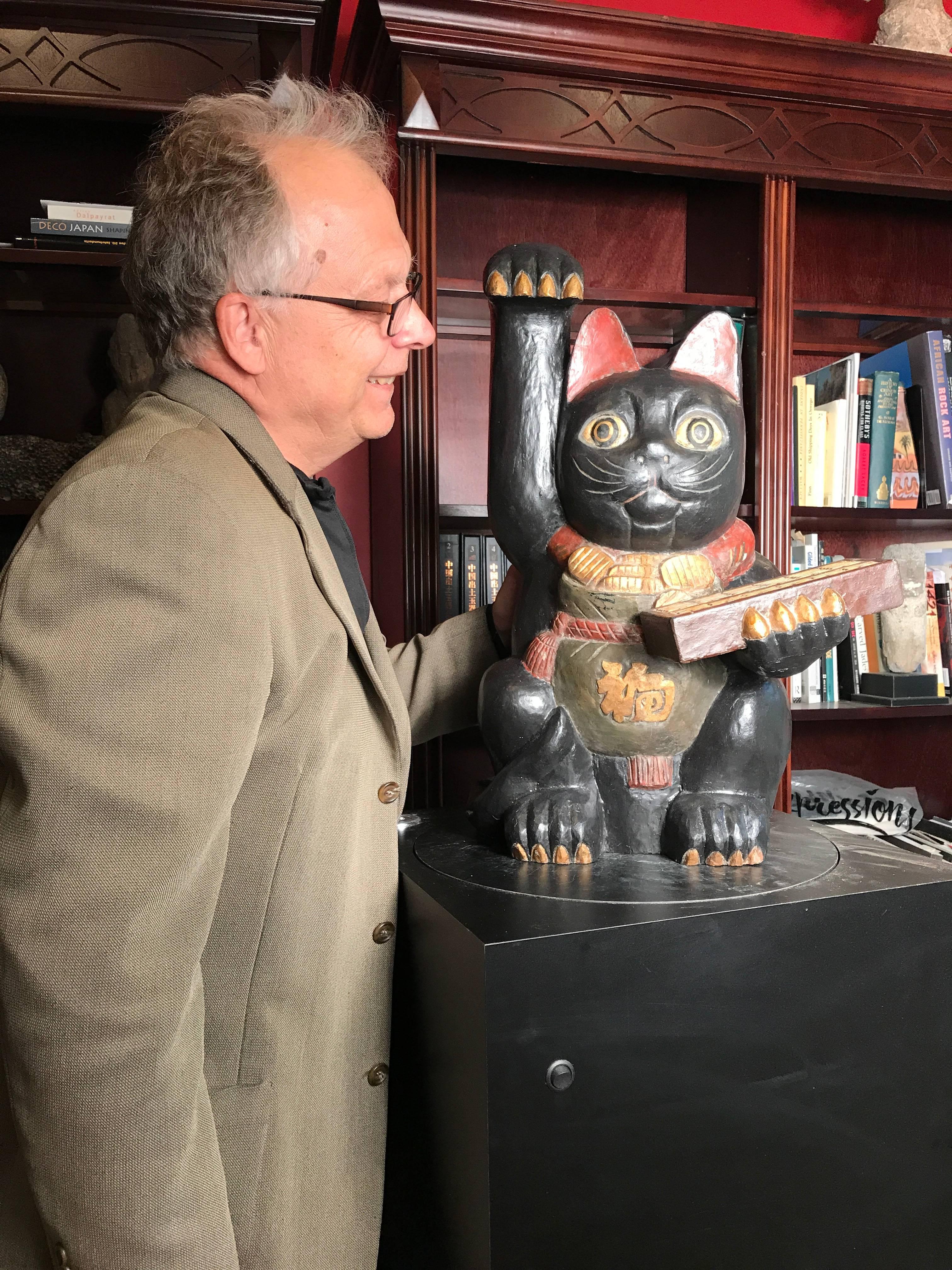 Japan a rare large-scale and lovely hand-carved and hand-painted wooden Maneki Neko good fortune money cat.

It is signed bottom Shugetsu Gatana, Meiji 4th year (1872) and dates to the mid Meiji period (1868-1911).

Dimensions: Big 22.5 inches tall
