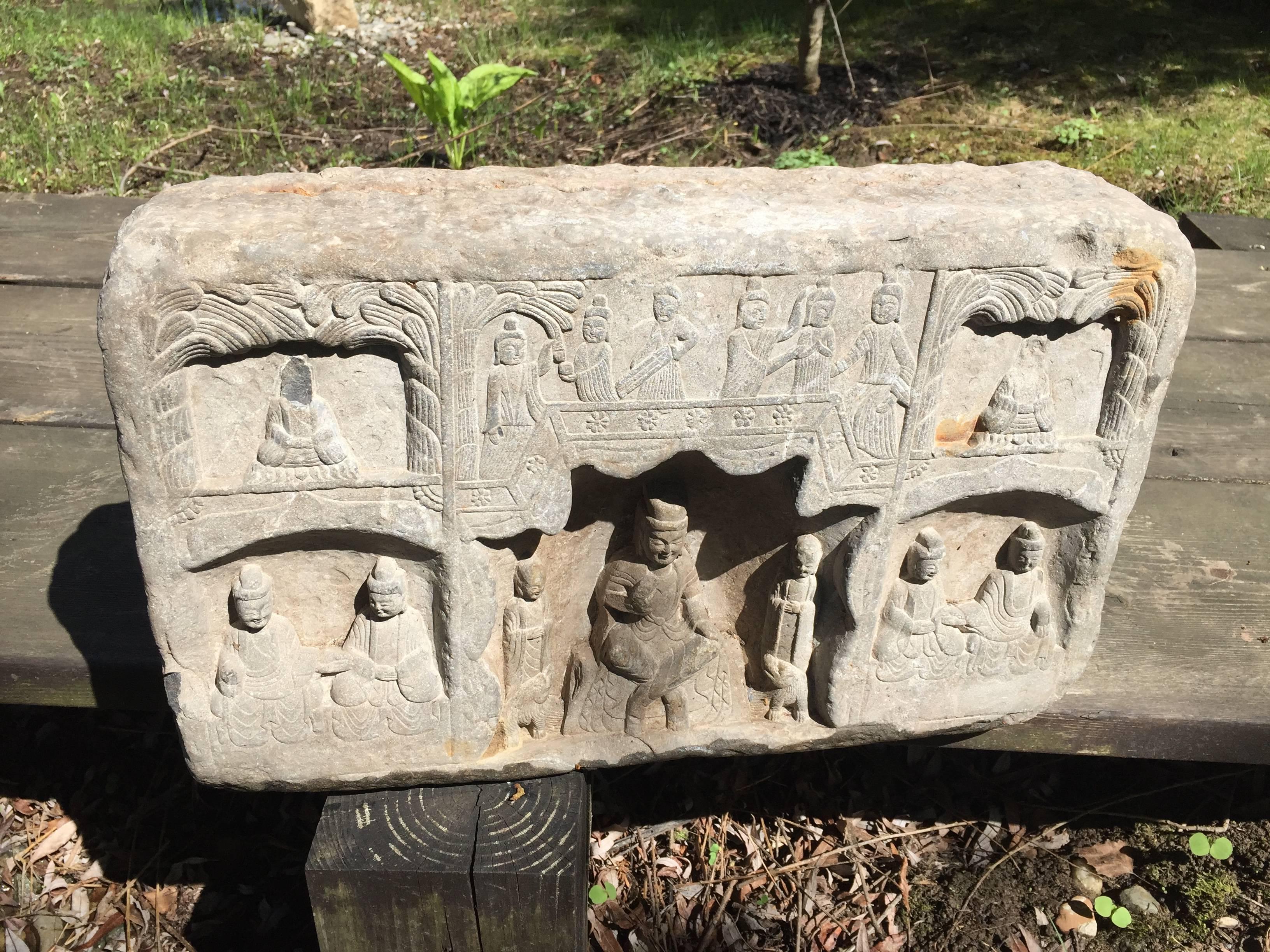 carved stone buddha