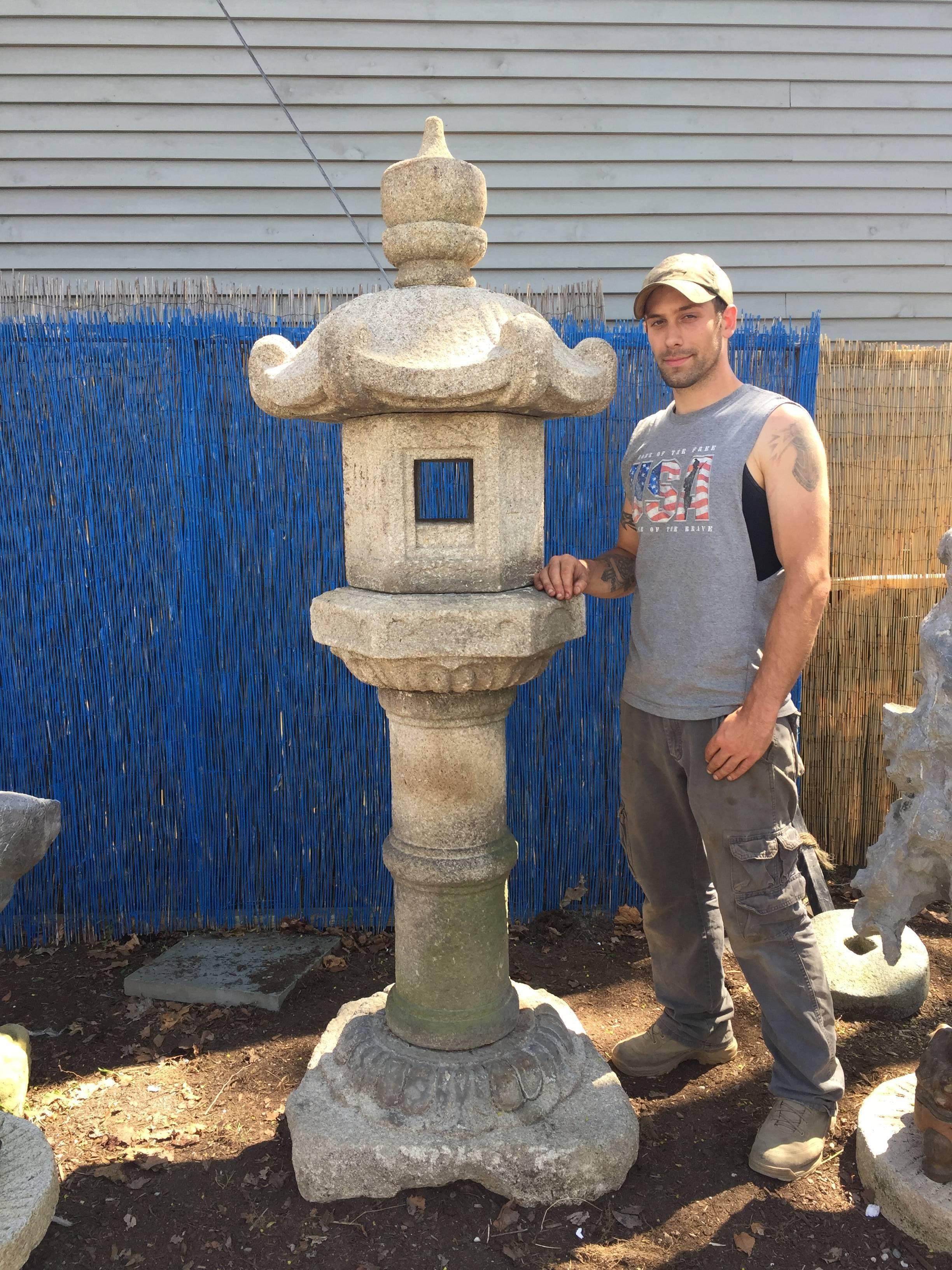 Japan, a Classic antique hand-carved stone Kasuga lantern,carved from solid granite, Edo period, (1800-1868 CE)

Dimensions: 78 inches high and 28 inches wide at top

The monumental and well-proportioned carved stone Kasuga style lantern fashioned