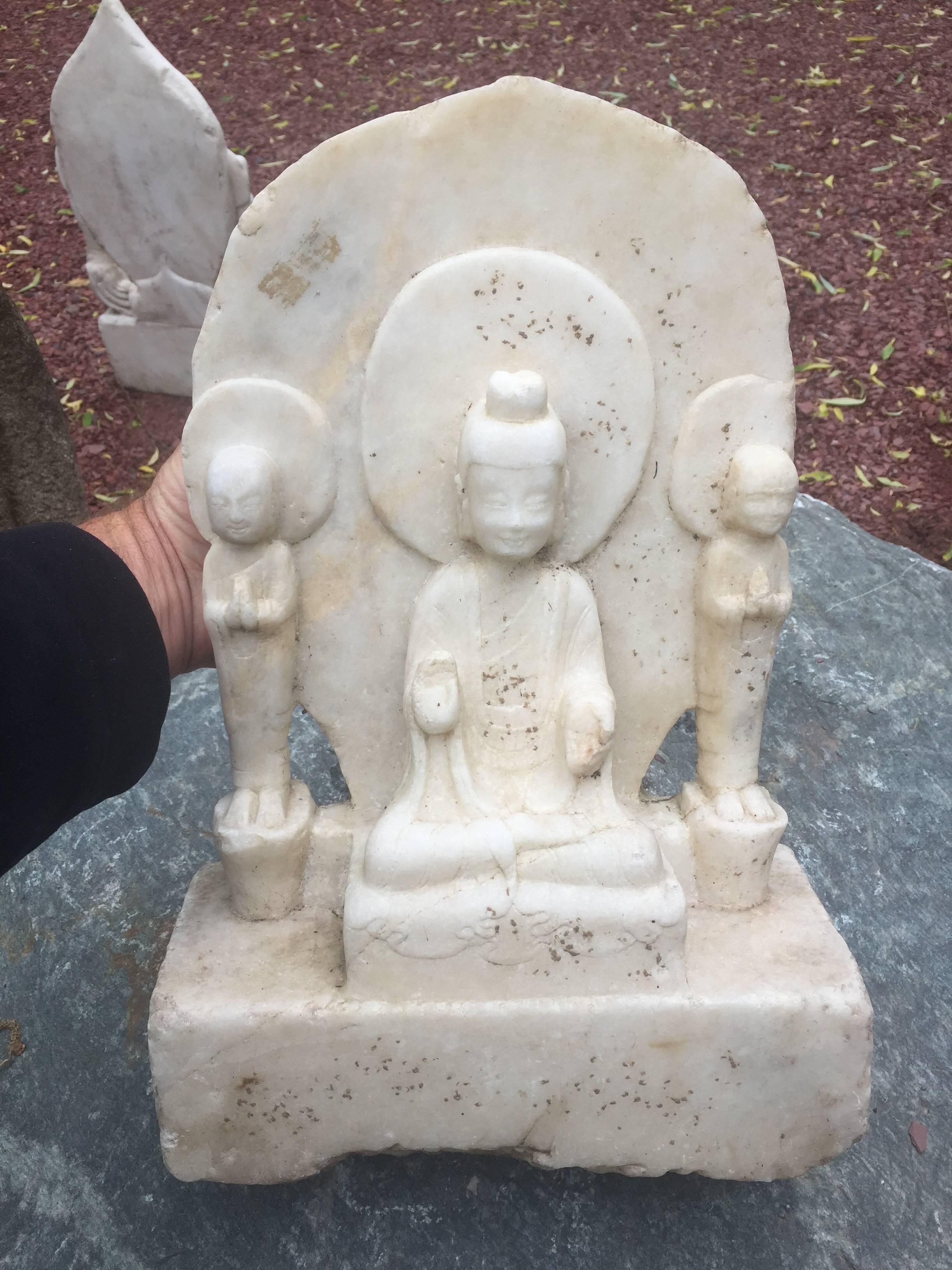 This substantial older hand-carved sculpture with a sensual carving of a Guan yin the Buddhist Bodhisattva comes from a fifty year old Chinese antique stone collection formed in the 1970s-1980s. We are offering the last works from this one of a kind