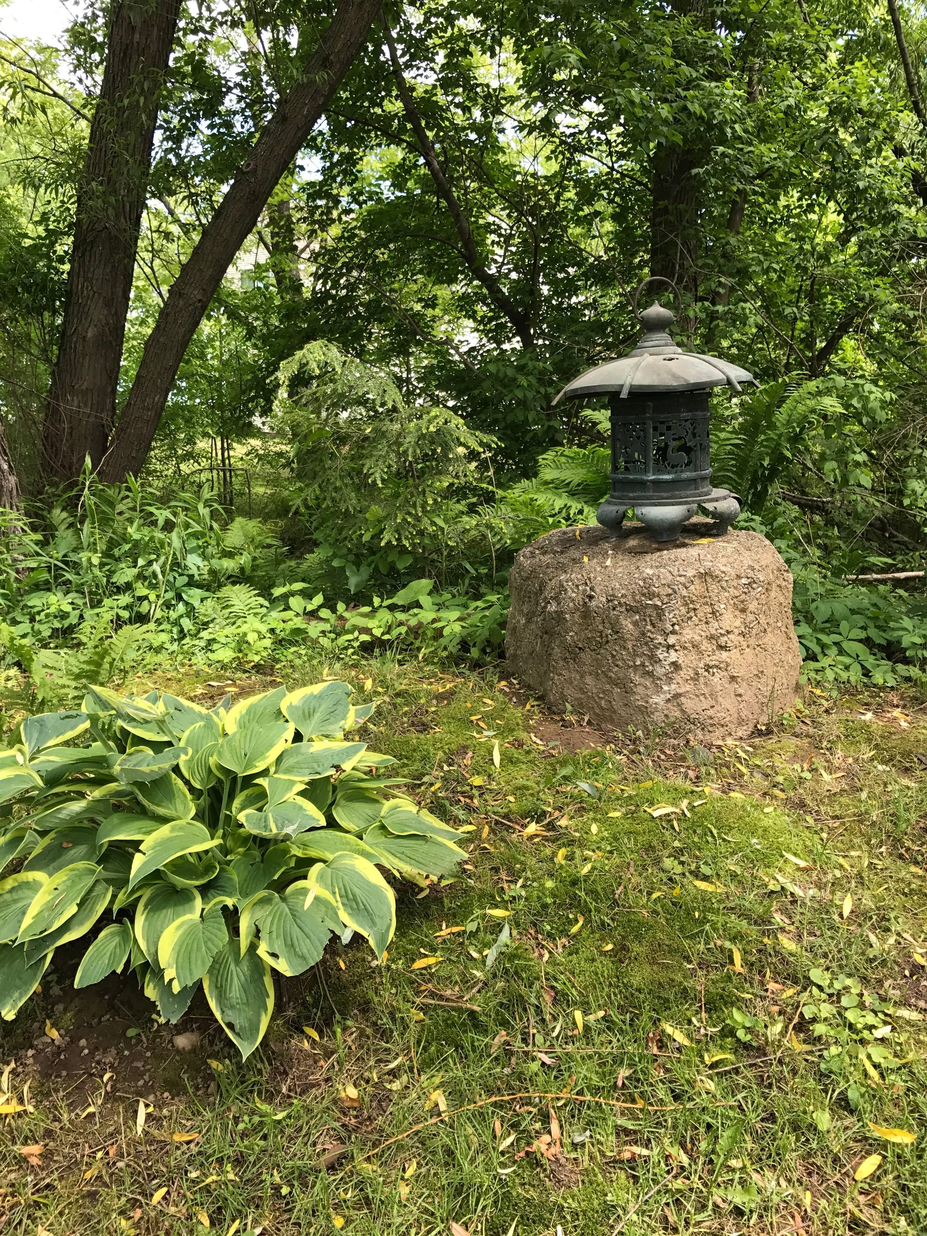 Japan, an unusual and handsome large antique handcrafted temple lotus bronze lantern with an unusual and fine deer and crane motif.

This is the first of this style we have seen in over fifteen years of dealing with fine Japanese garden ornaments.