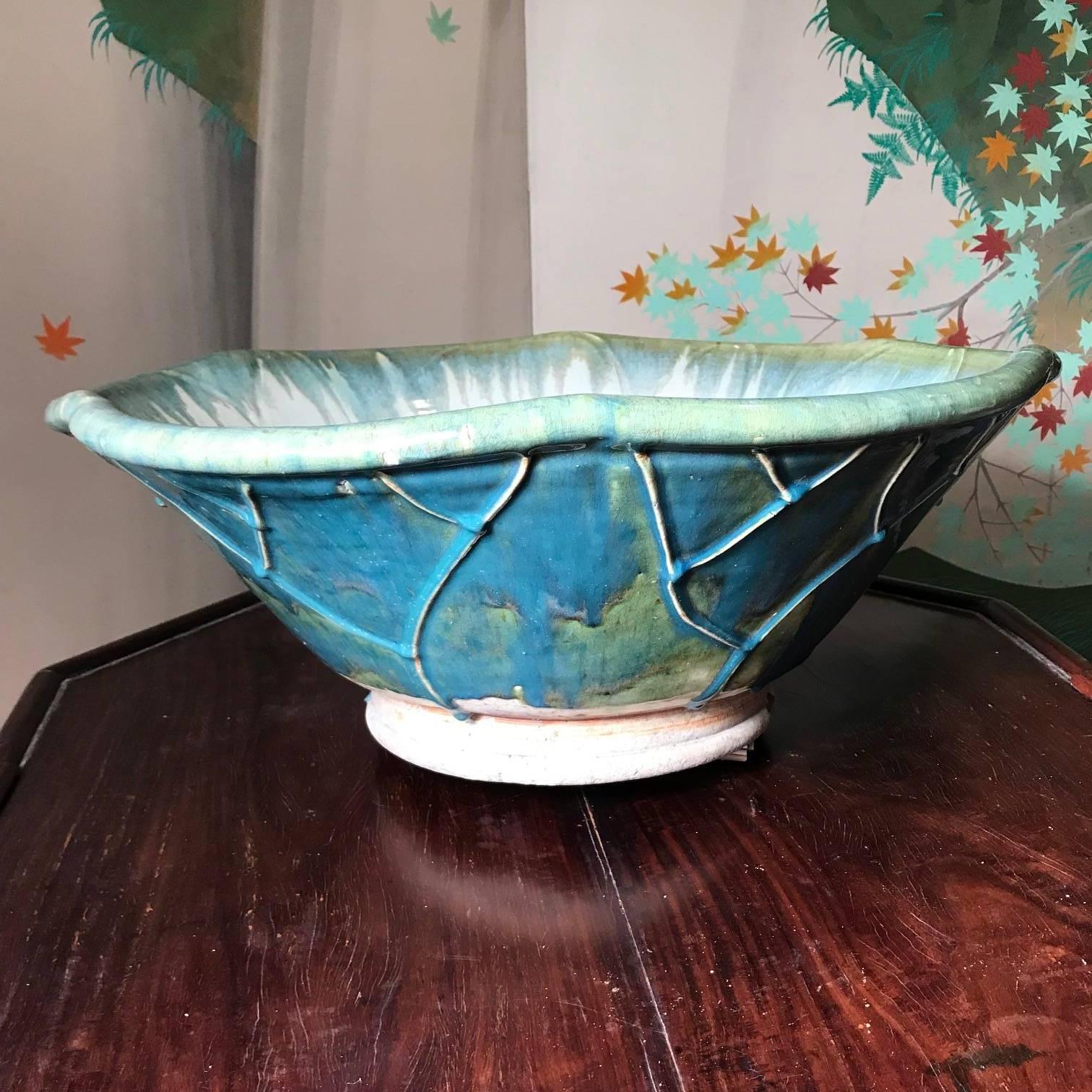Japan, a big handsome, handmade, and hand glazed one-of-a-kind heavy thick stone ware vessel crafted in a lotus vein organic style and from unique Japanese clay called choseki (long life clay). This glazed planter or water vessel (mizubachi) comes