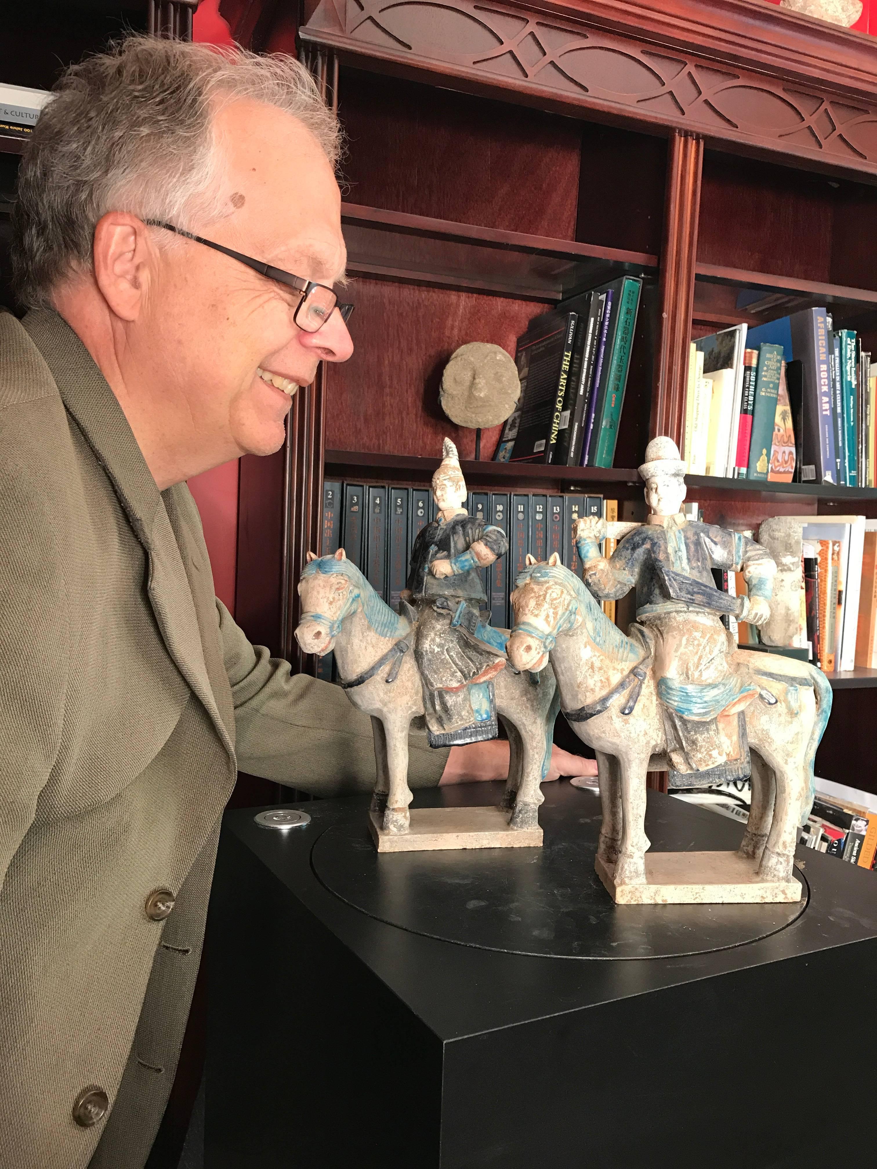 A pair of ancient Chinese Ming tall horse riders, a male and female, Ming dynasty (1368-1644)

Crafted in stunning turquoise and cobalt blue color glazes, 14.5 inches tall. 

The tall pair male and female and their steeds are part of a small group