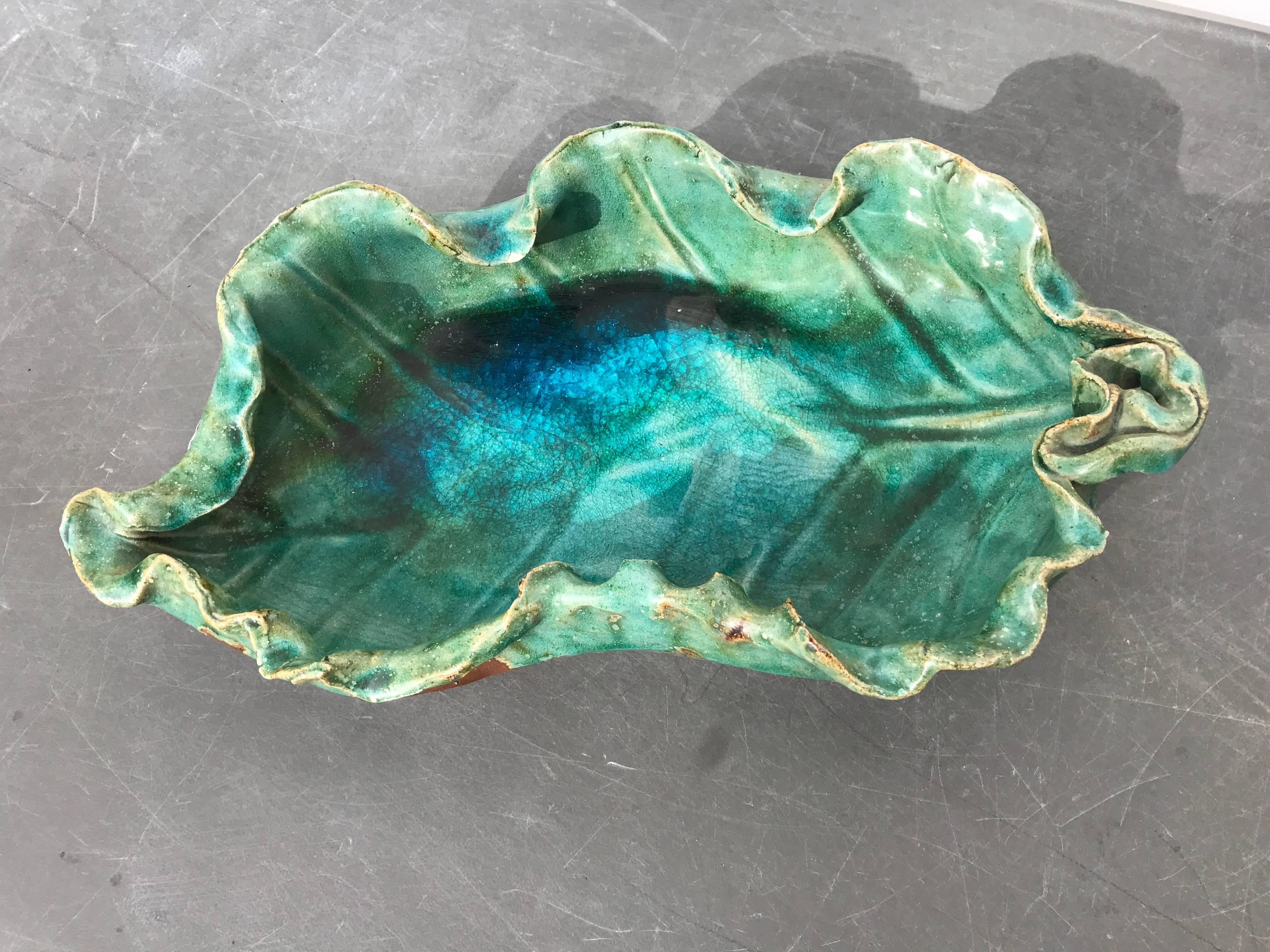 Japan, a stunning brilliant blue green glazed scalloped edge bowl - completely hand thrown and hand glazed.- a tour de force of color and form only a Japanese master Artisan could perform.

Hand glazed one-of-a-kind heavy thick stone ware vessel