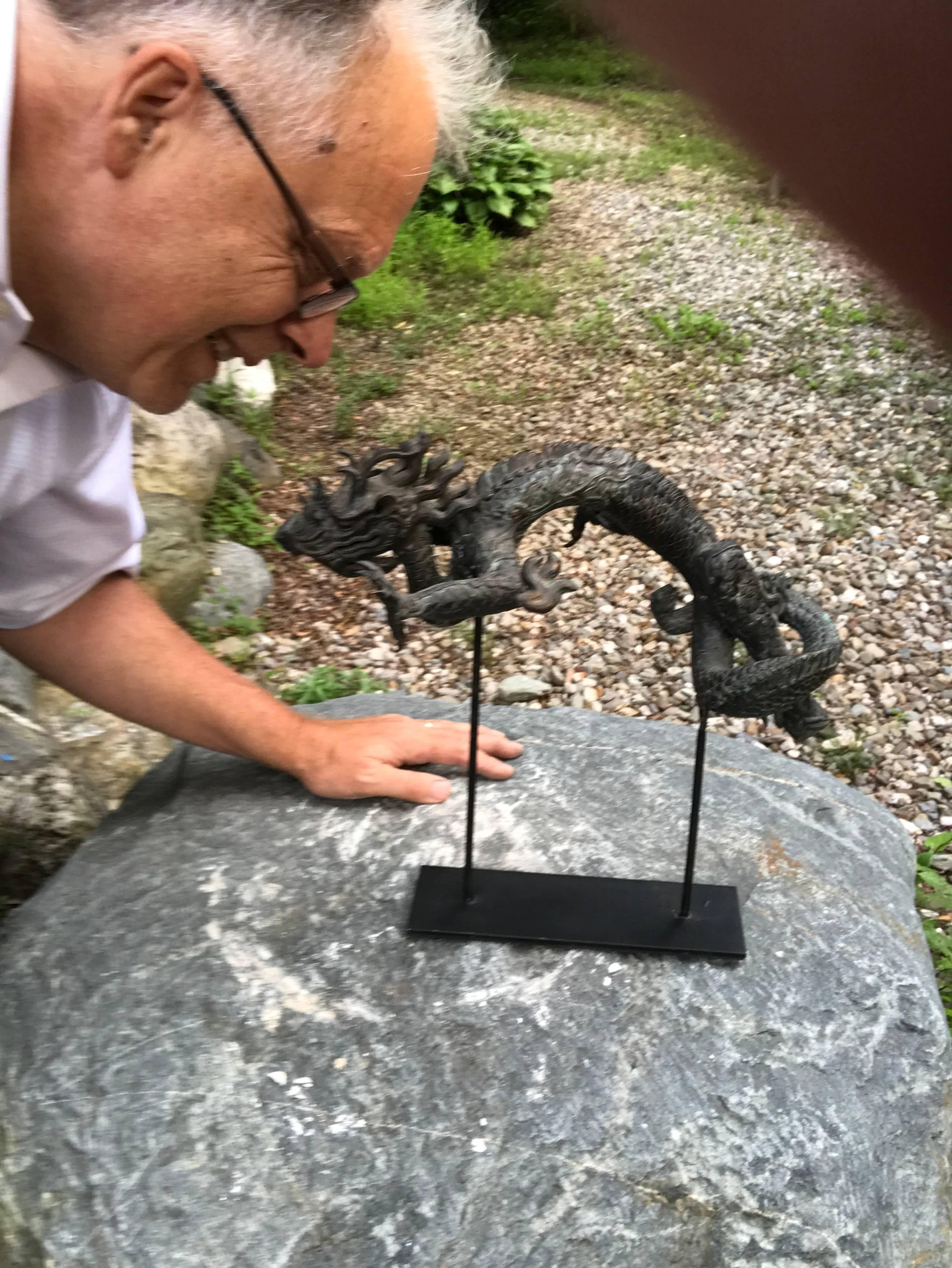 China, a rare hand caste, hand-wrought bronze antique  -5 claw-  dragon sculpture of a large writhing dragon. It possesses excellent detail.  Five claw dragons are associated with imperial works of art. 

We will include a custom metal display Stand
