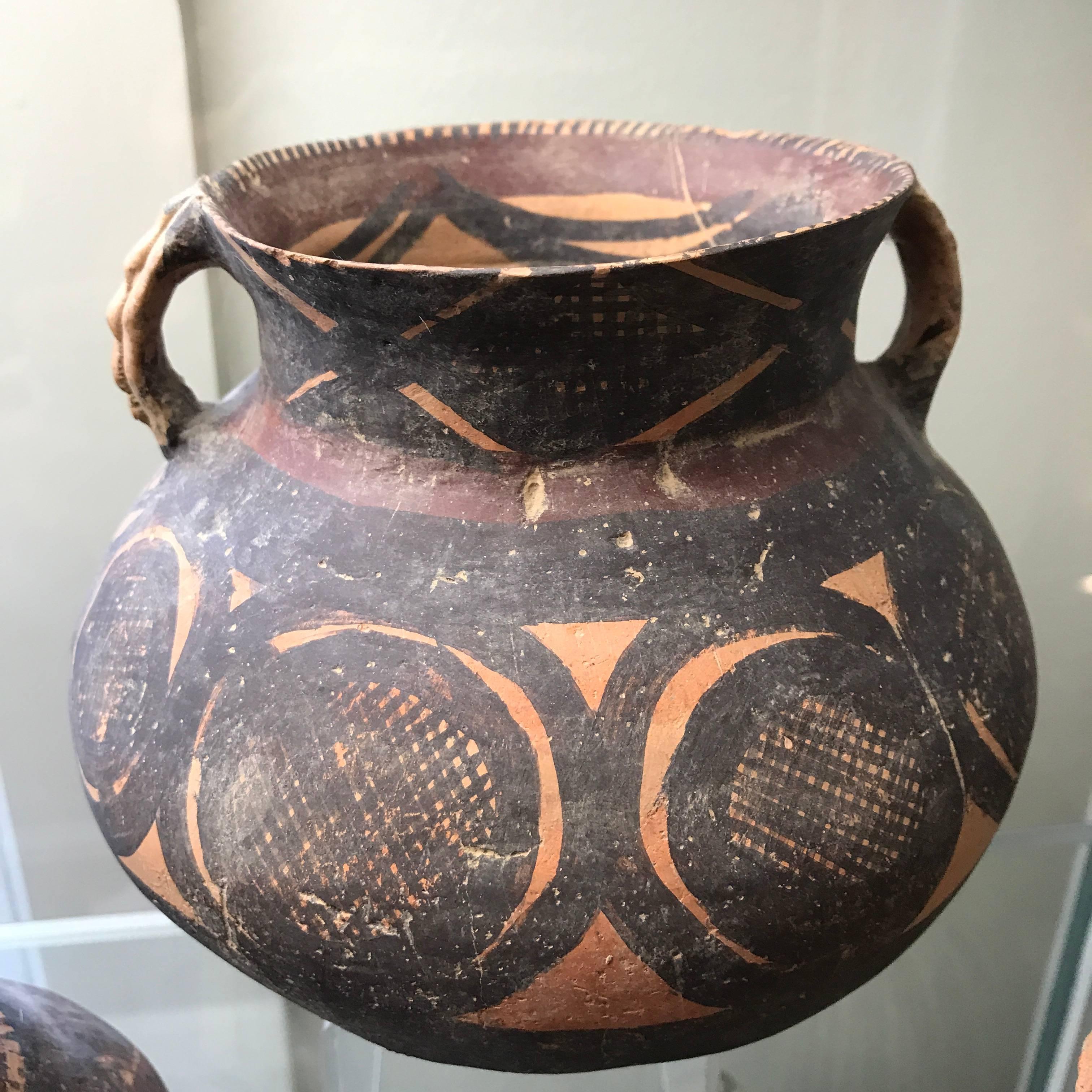 Ancient Chinese Collection Three (3) Fine Neolithic Pots

This is an excellent handmade and hand-painted collection of three (3)  Ancient Chinese Machang culture pots with brilliant designs dating to the 2500-2000 BCE era.

These pots are quite well