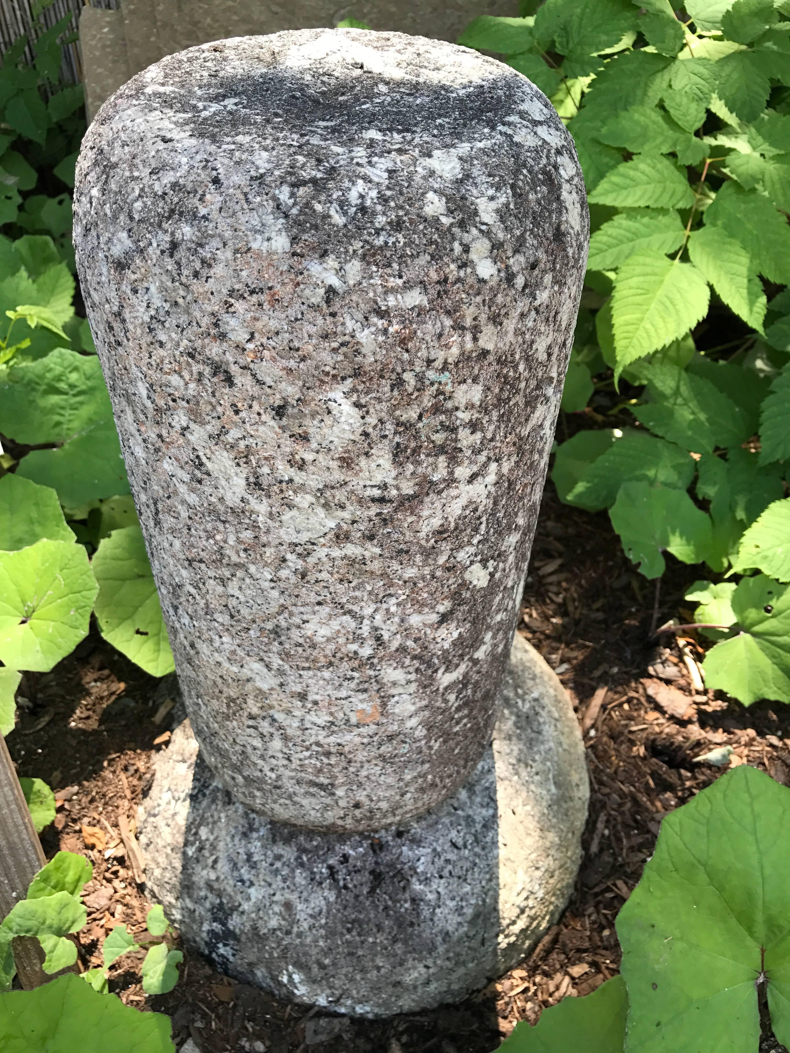 Japanese antique commemorative hand-carved stone marker with a family crest -Mon- dating to the early to mid-Edo period 18th century.

Hand-carved from a high quality solid granite called Mikage-ishi.

Fine old lichen encrusted patina.

Dimensions: