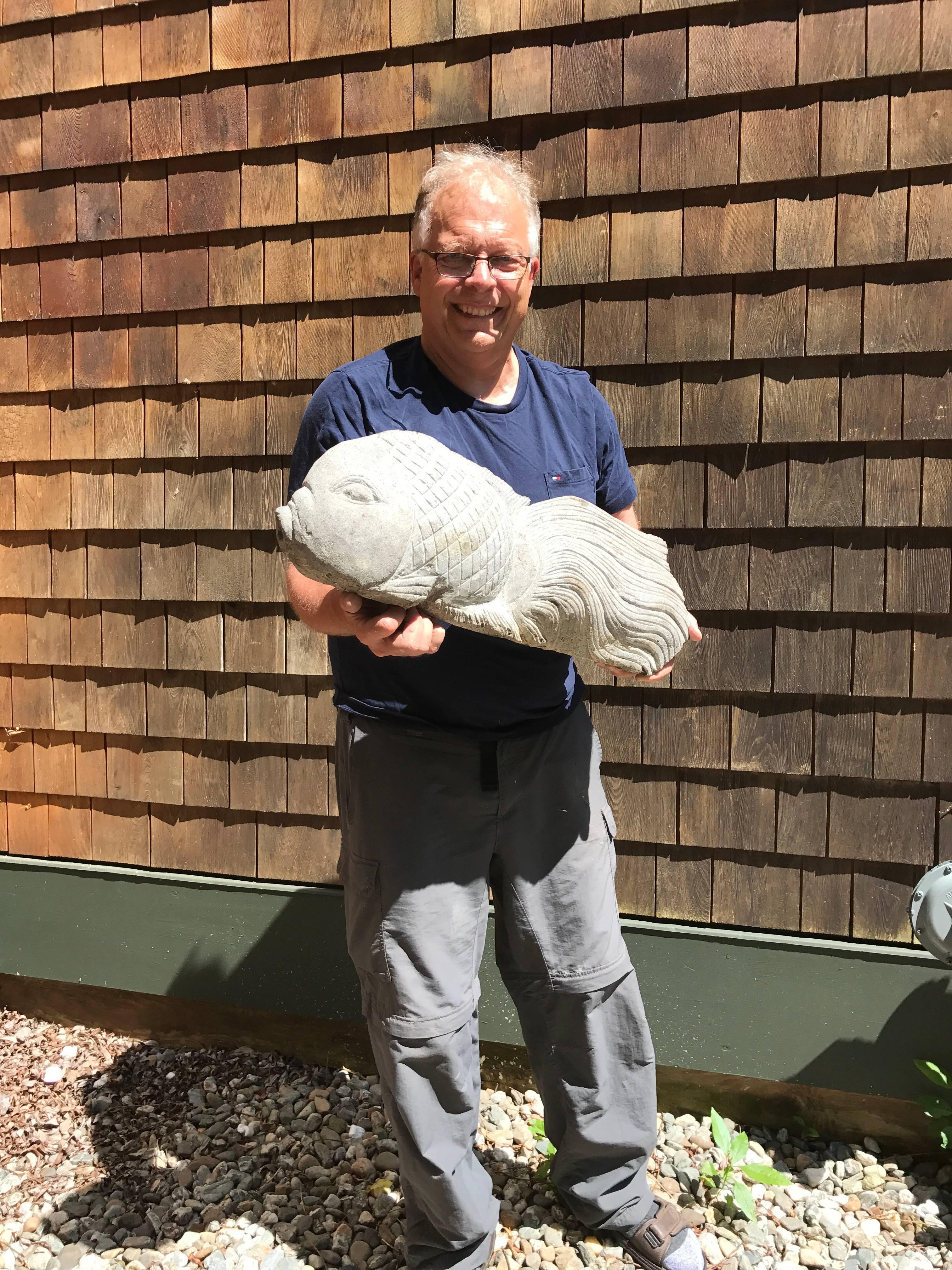 Here's a substantial and attractive hand-carved stone fish that might grace your favourite garden spot, koi pond, or indoor fisherman themed space.

This was sourced from an American garden collection this past year.

Quality: Fine smoothly carved