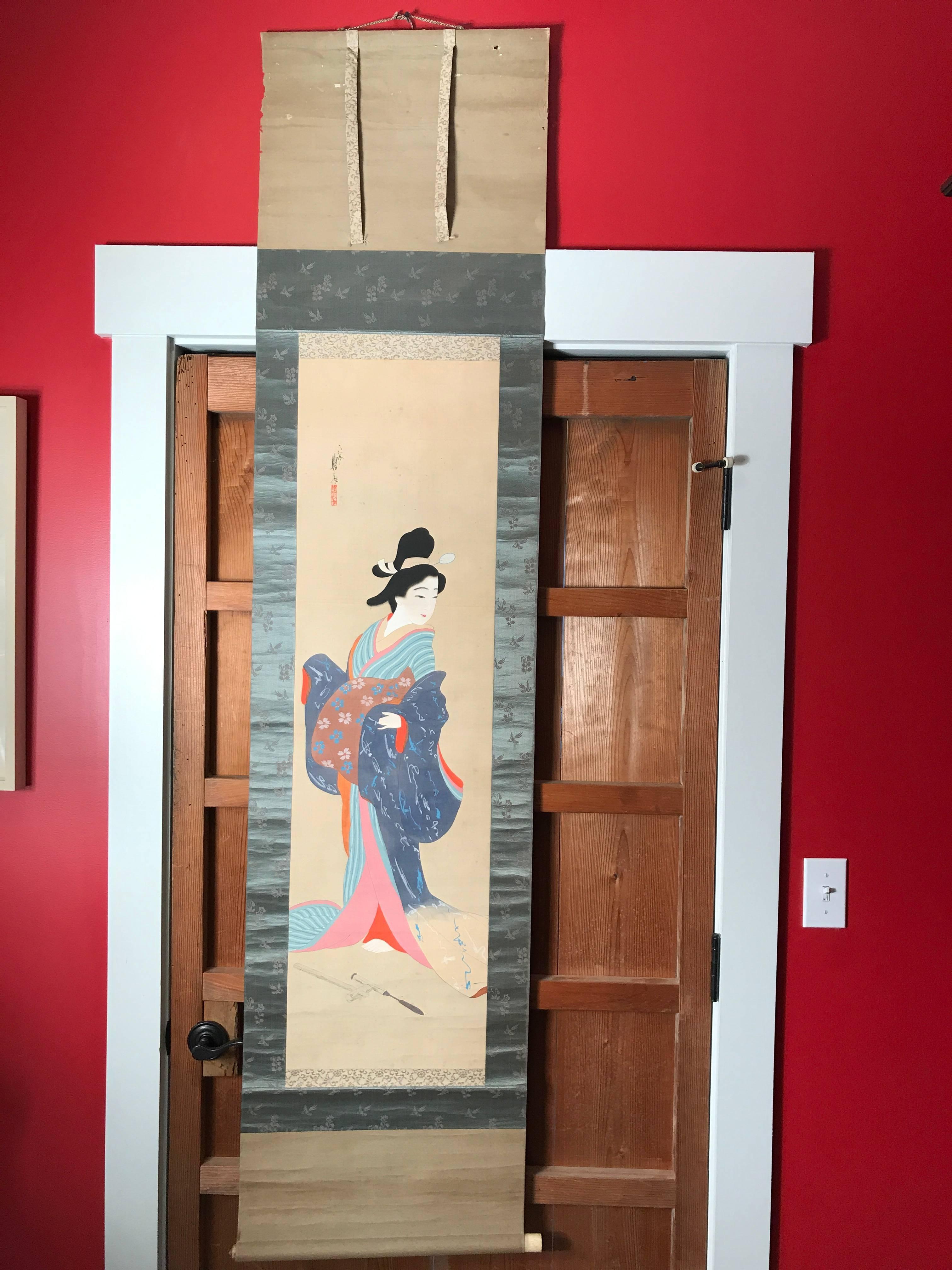 Old hand-painted scroll Bijin wearing beautiful blue kimono
Dimensions: 18.25 inches wide and 76 inches length
Hand written collector signature 

Japan, attractive composition of a Bijji beauty with beautiful blue kimono

Hand-painted. Old bone