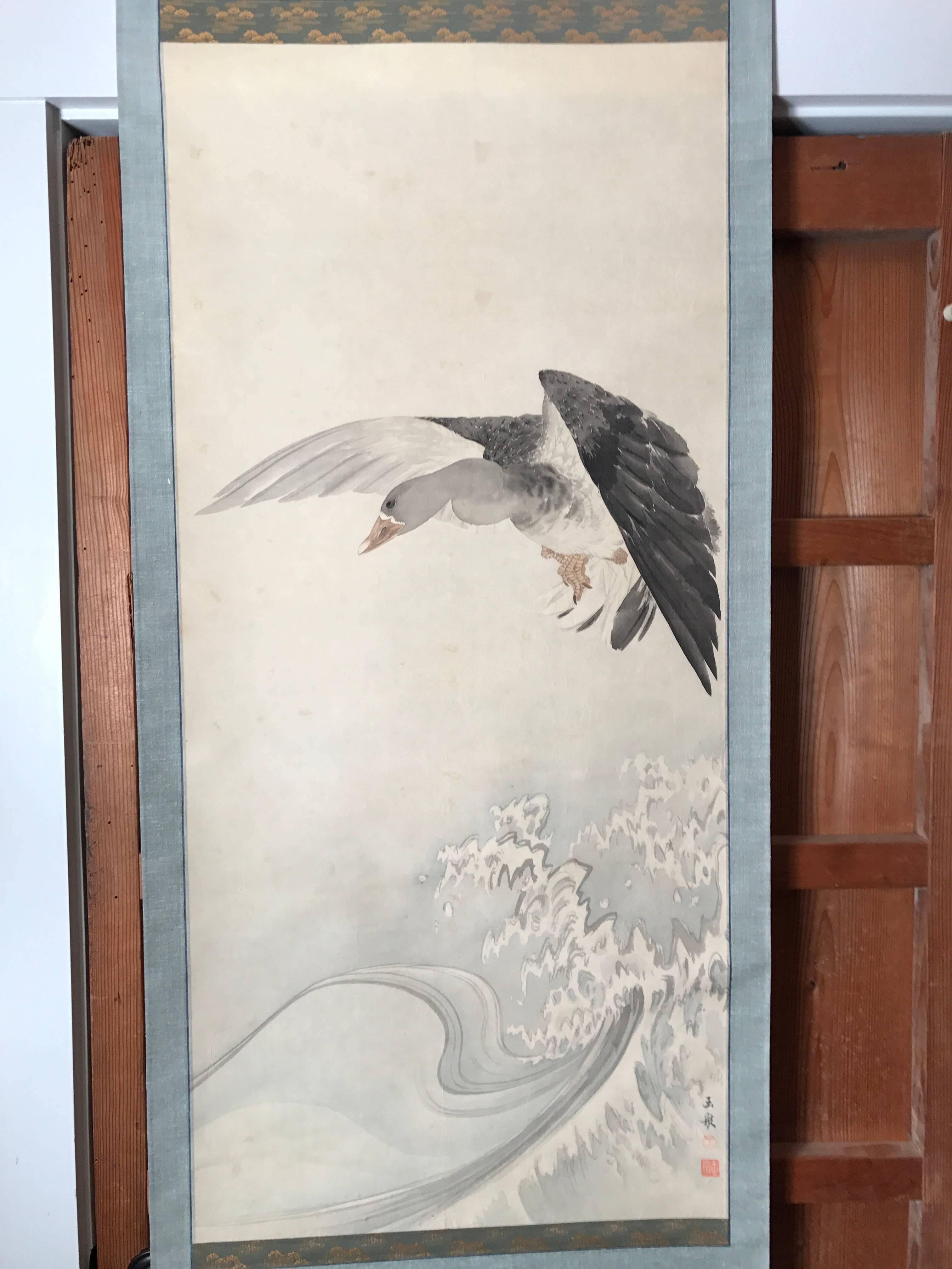 Japanese Old Soaring Mallard Duck Above Waves. 
Hand-painted scroll on paper.
Dimensions: 23.5 inches wide and 68.5 inches length
Hand written Collector signature as photographed
Hardwood rollers.

Japan, attractive composition of a wonderful