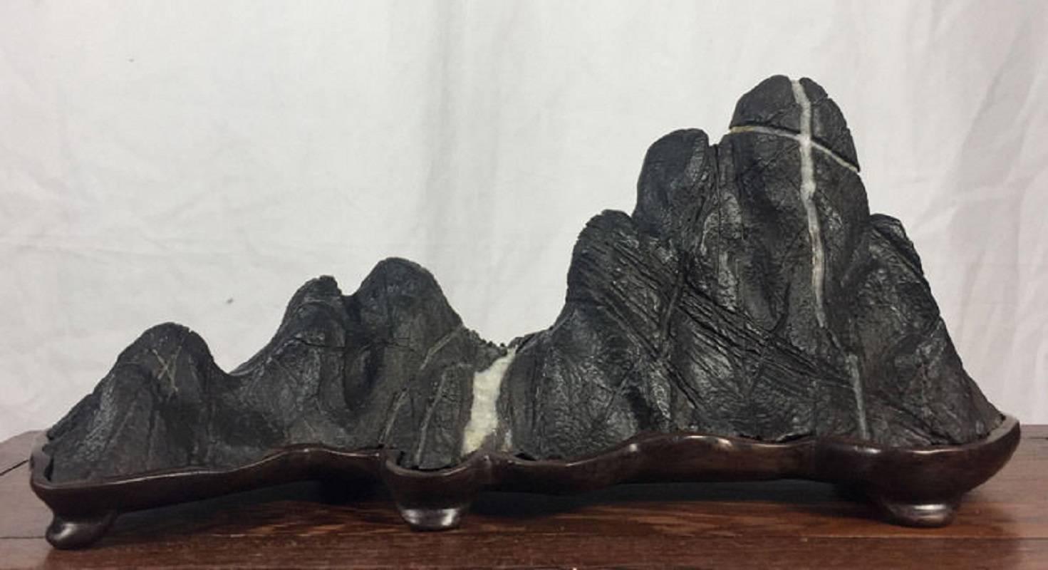 What do you see- mountains, glaciers, streams or snow trails ?

Here's a great one-of-a-kind sculptural candidate for your garden, special Asian setting or as a thoughtful unique gift.

This contemporary Mountain scholar rock or viewing stone known